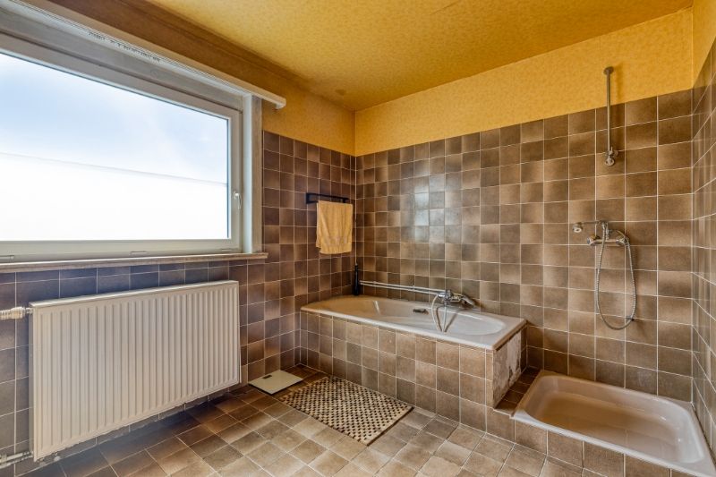 Ruime open bebouwing met potentieel in groene, rustige buurt van Evergem foto 7