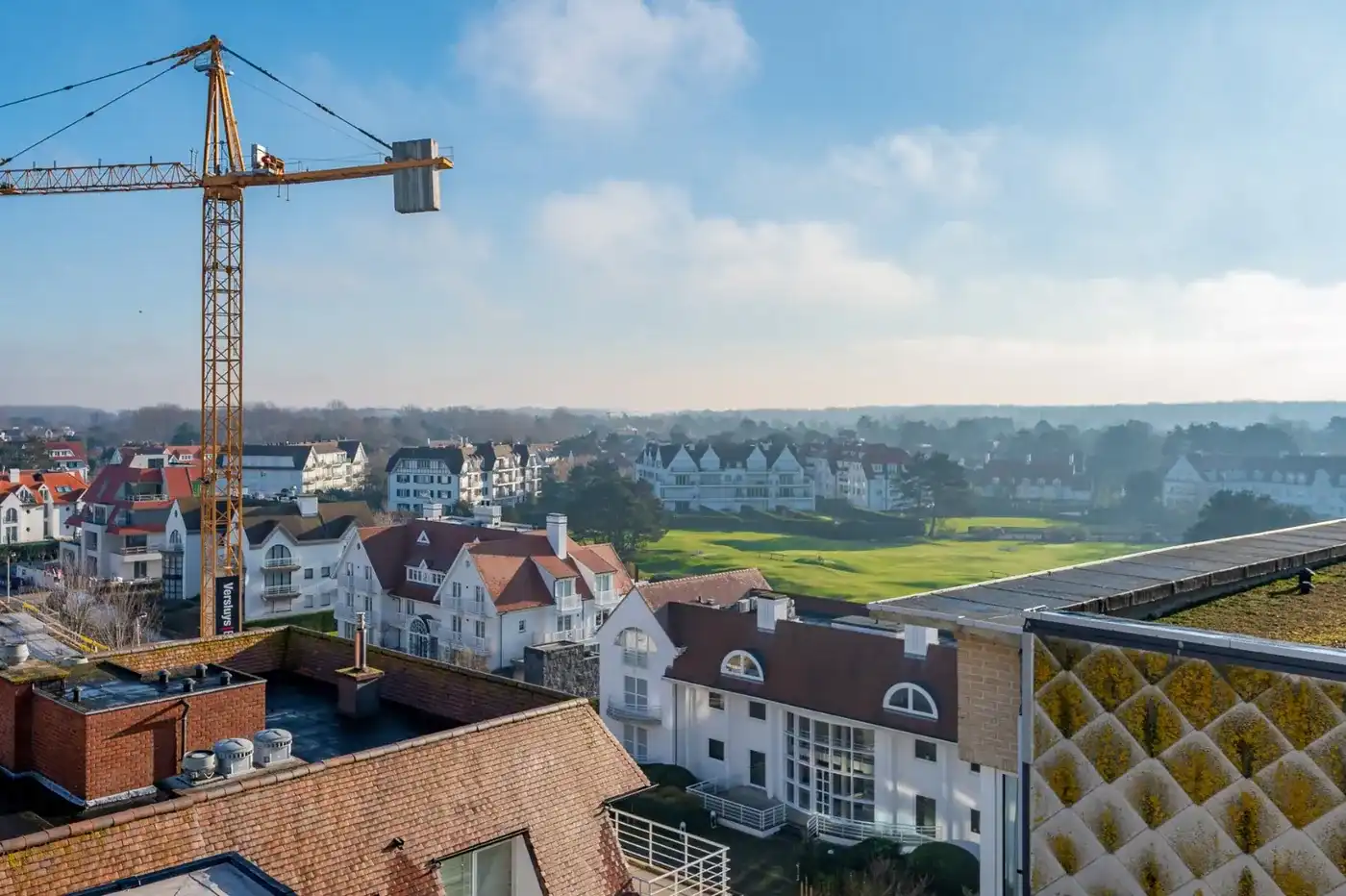 Nieuwbouw duplex/penthouse in hartje Zoute genietend van prachtige open zichten op de minigolf en zeezicht.  foto 11