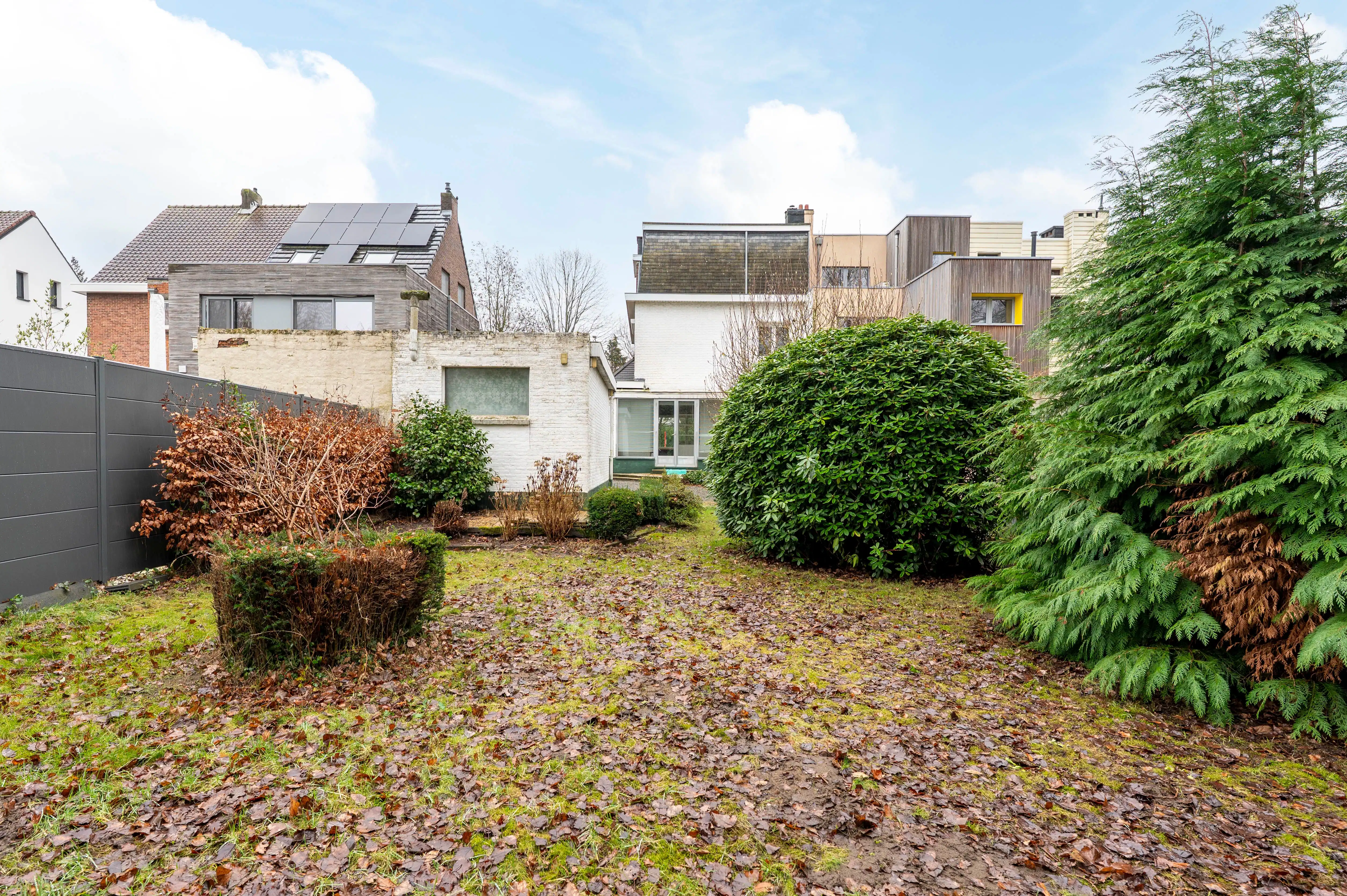 Halfopen bebouwing met veel potentieel, zonnige tuin en garage in Kapellen! foto 22