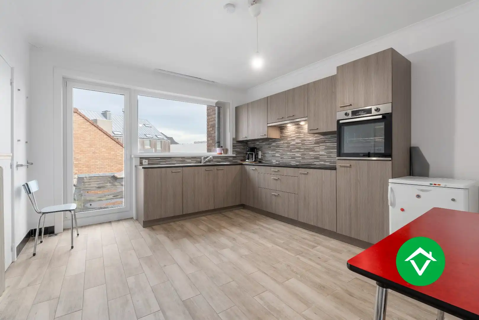 Veelzijdig handelspand met woonst en twee verhuurde appartementen in centrum Aartrijke foto 23