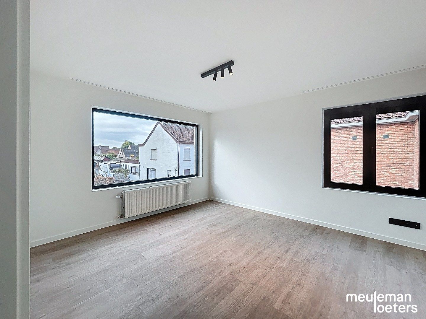 Instapklare woning met tuin en ruime garage foto 9