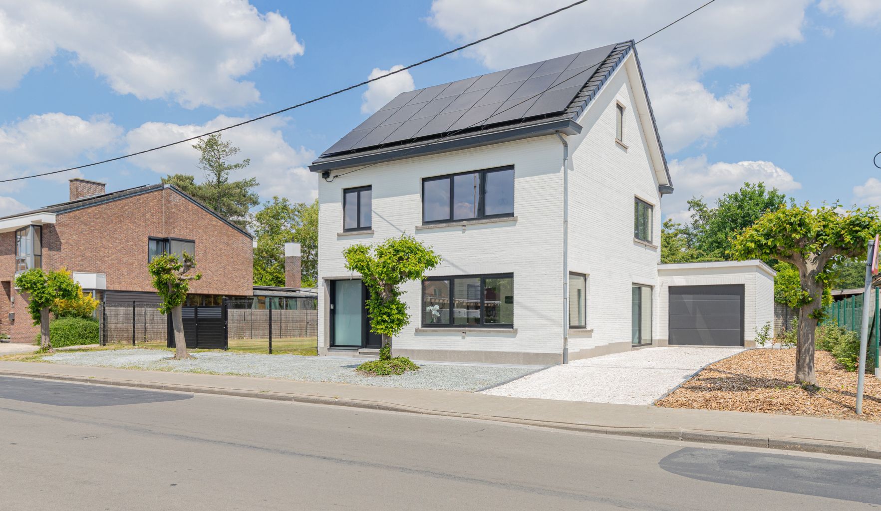 Instapklare gezinswoning met garage in hartje Sint-Amands! foto {{pictureIndex}}