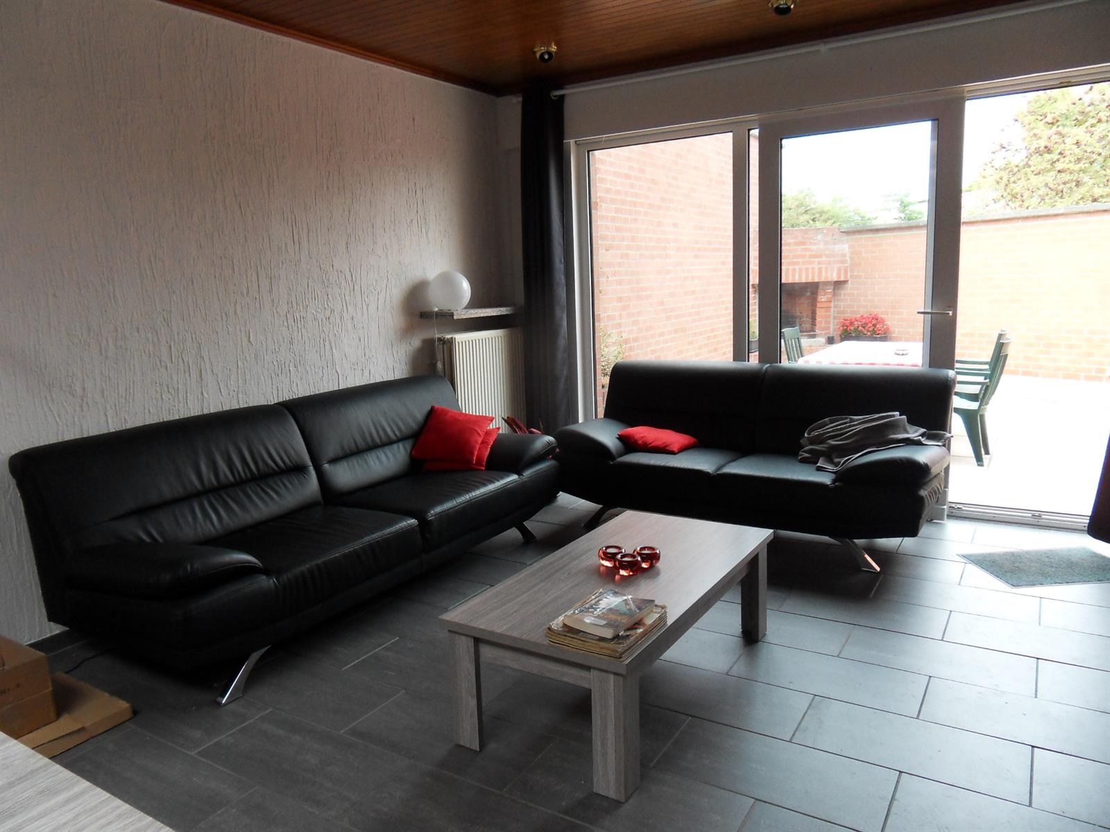 Ruime instapklare rijwoning met 4 slaapkamers en aangenaam terras. foto 4