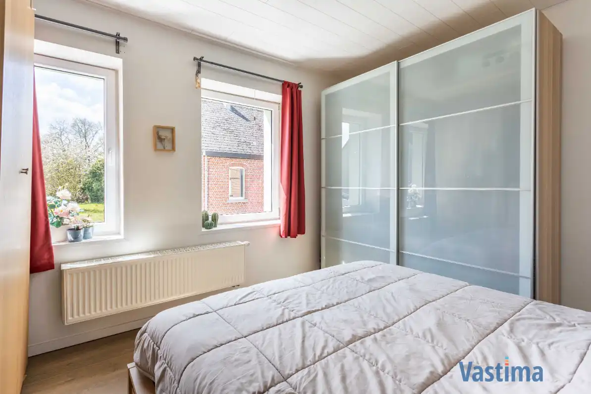 Energiezuinige en instapklare starterswoning met 2 slaapkamers in hartje Erembodegem foto 13