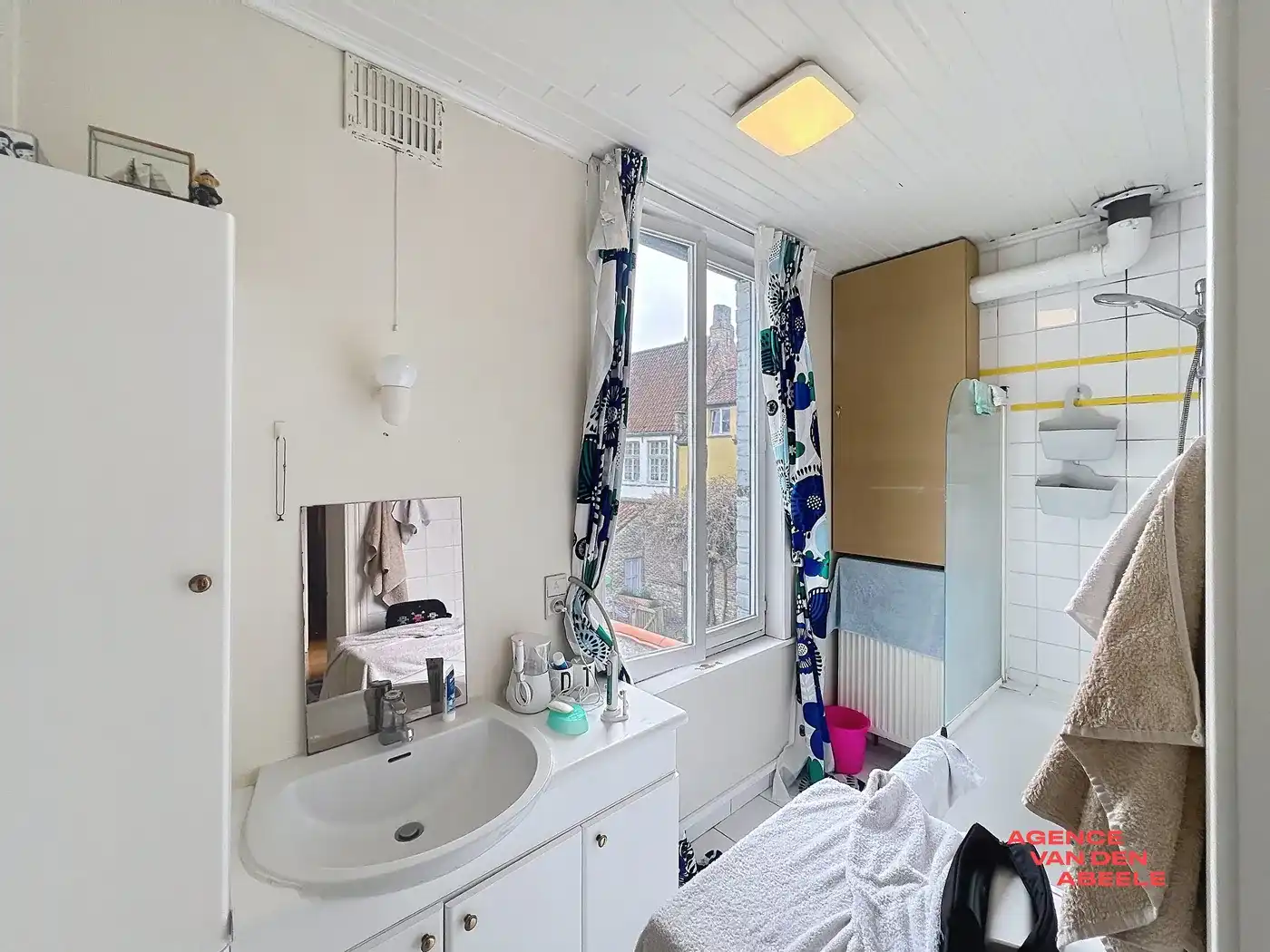 Centraal gelegen handelswoning met 4 slaapkamers en riante tuin  foto 19