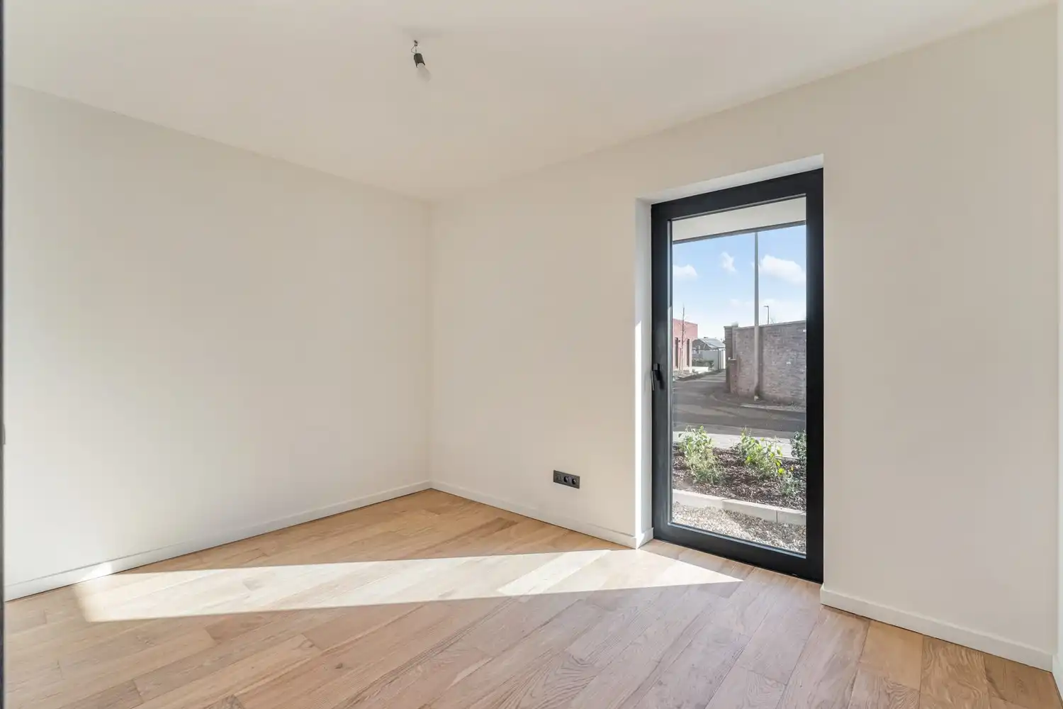 Instapklaar nieuwbouwappartement met 2 slaapkamers, tuin en terras in het centrum van Borgloon foto 9