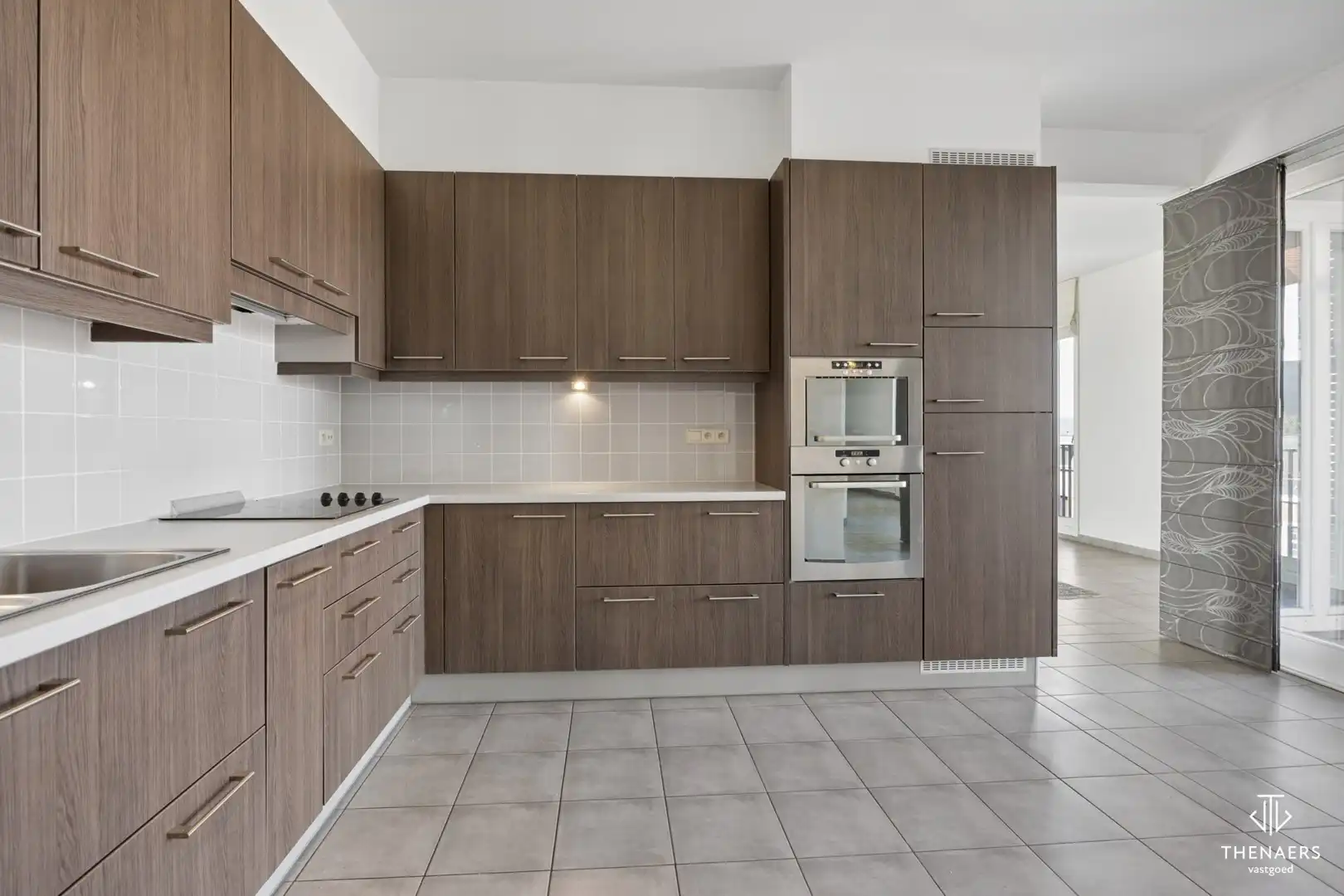 Ruim appartement van 166 m² met 2 terrassen en ondergrondse autostaanplaats in hartje Sint-Truiden. foto 10