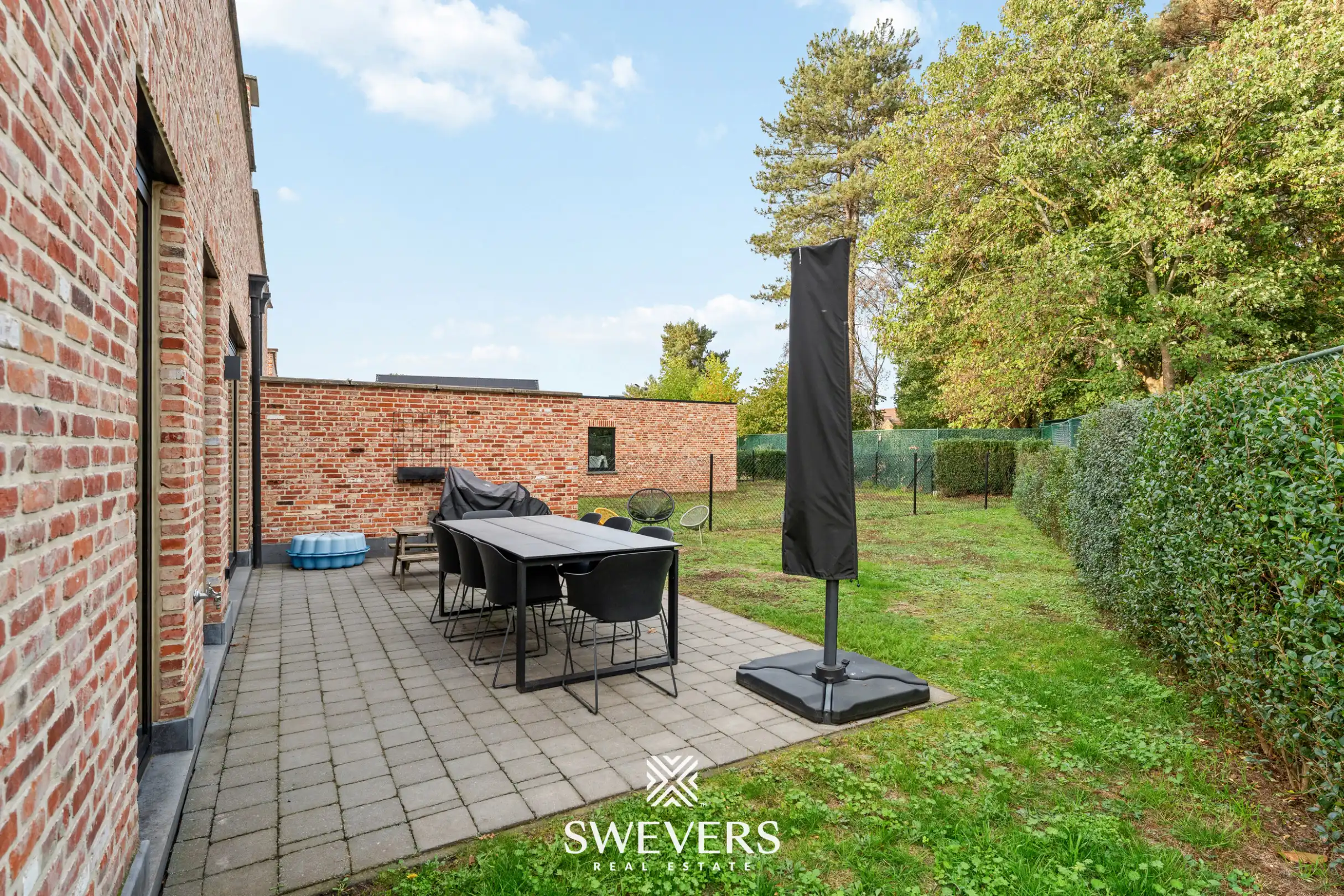 Instapklaar gelijkvloers 2 slpk-appartement met terras en tuin in Heusden. foto 20