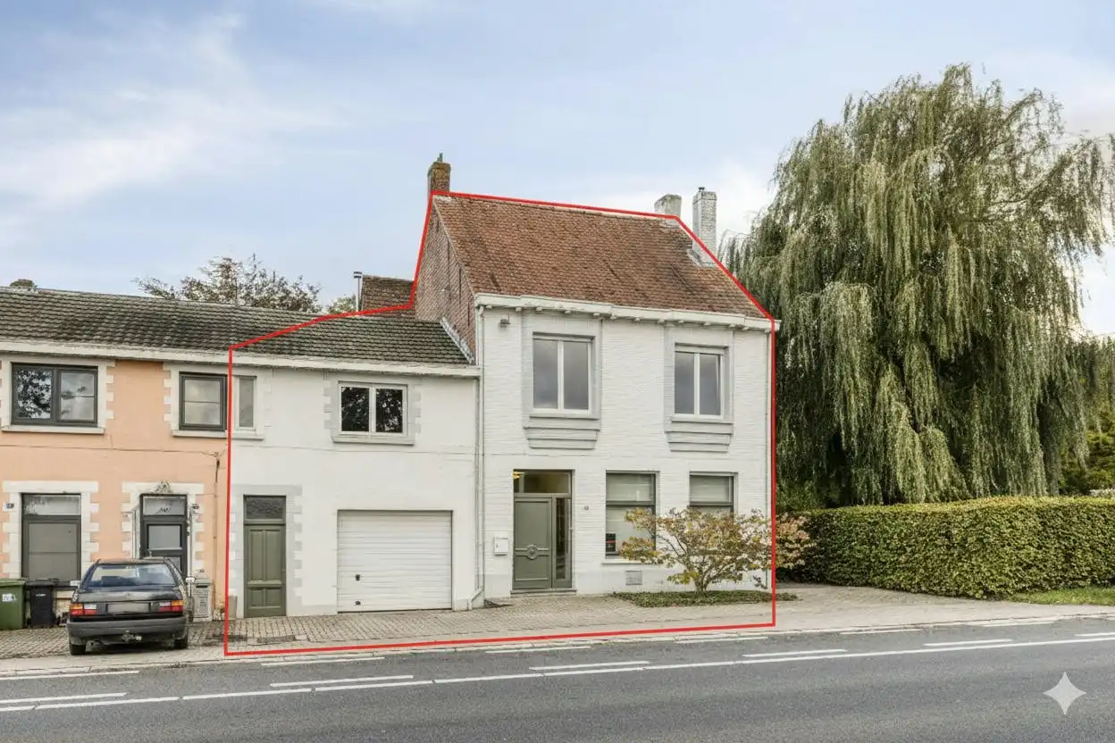 Karaktervol huis met grote tuin te koop in Wuustwezel! foto 2