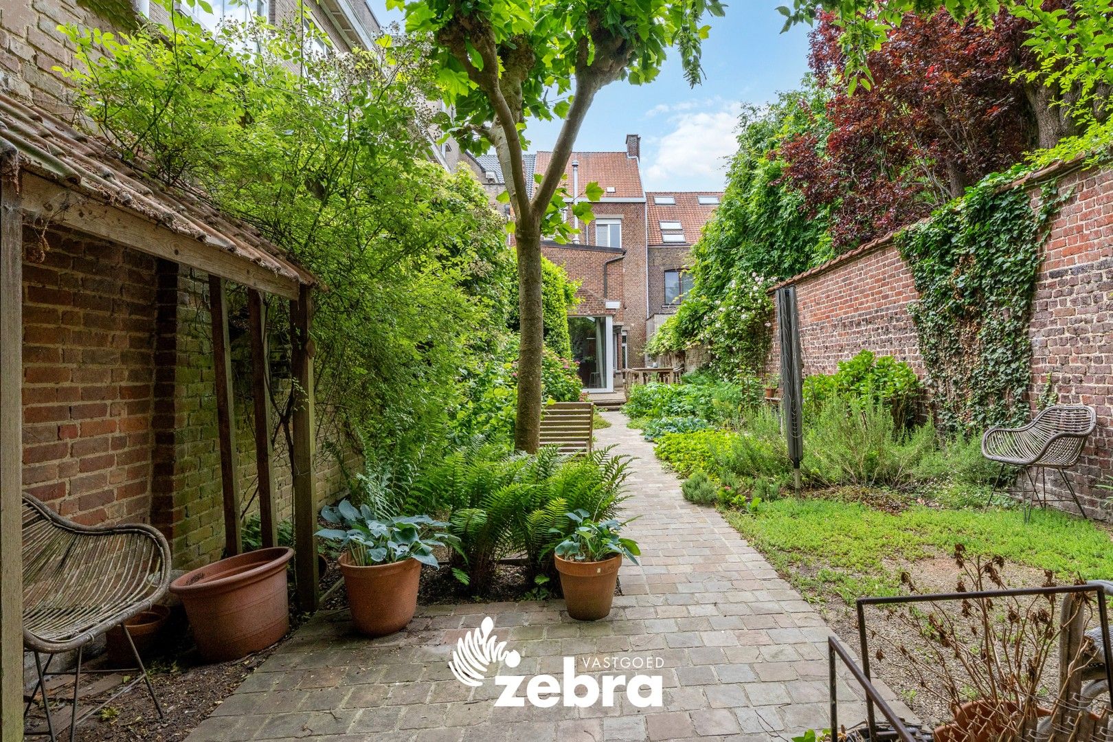 Karaktervolle herenwoning met ruime tuin in hartje Roeselare! foto 33