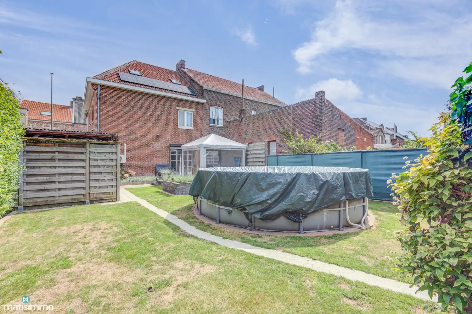 KARAKTERVOLLE EENGEZINSWONING MET 5 SLAAPKAMERS, GARAGE, CARPORT EN TUIN NABIJ HET CENTRUM VAN BILZEN foto 35