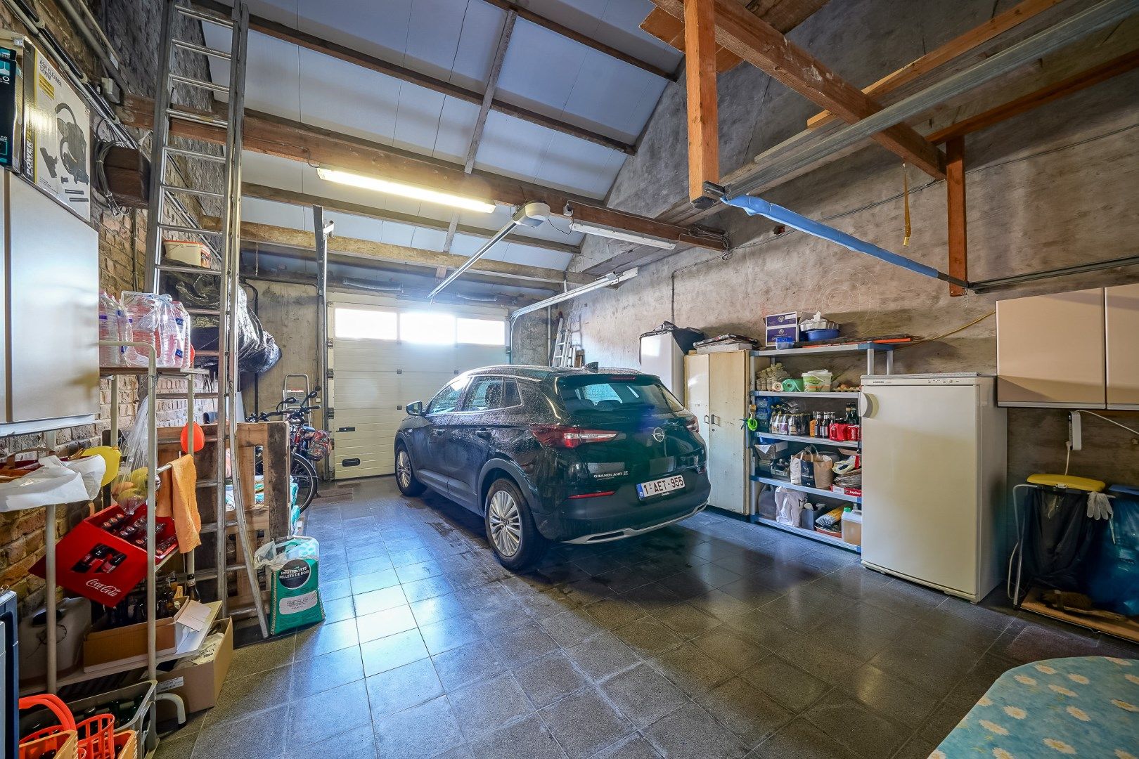 TE KOOP  instapklare woning met grote zonnige tuin en garage/loods. foto 10