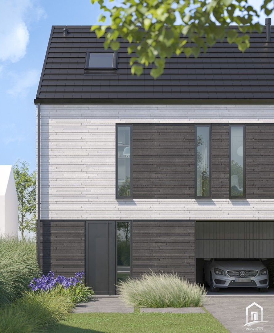 Halfopen nieuwbouwwoning met tuin en garage te Denderleeuw foto {{pictureIndex}}