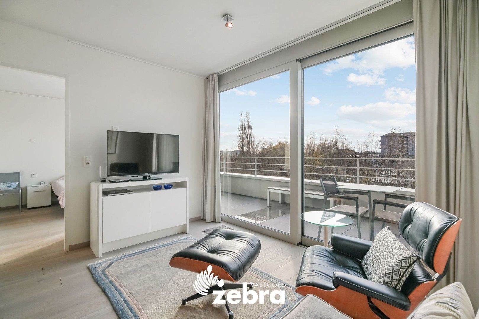 Moderne serviceflat met prachtig zicht op de Leie en autostaanplaats te Deinze! foto 4