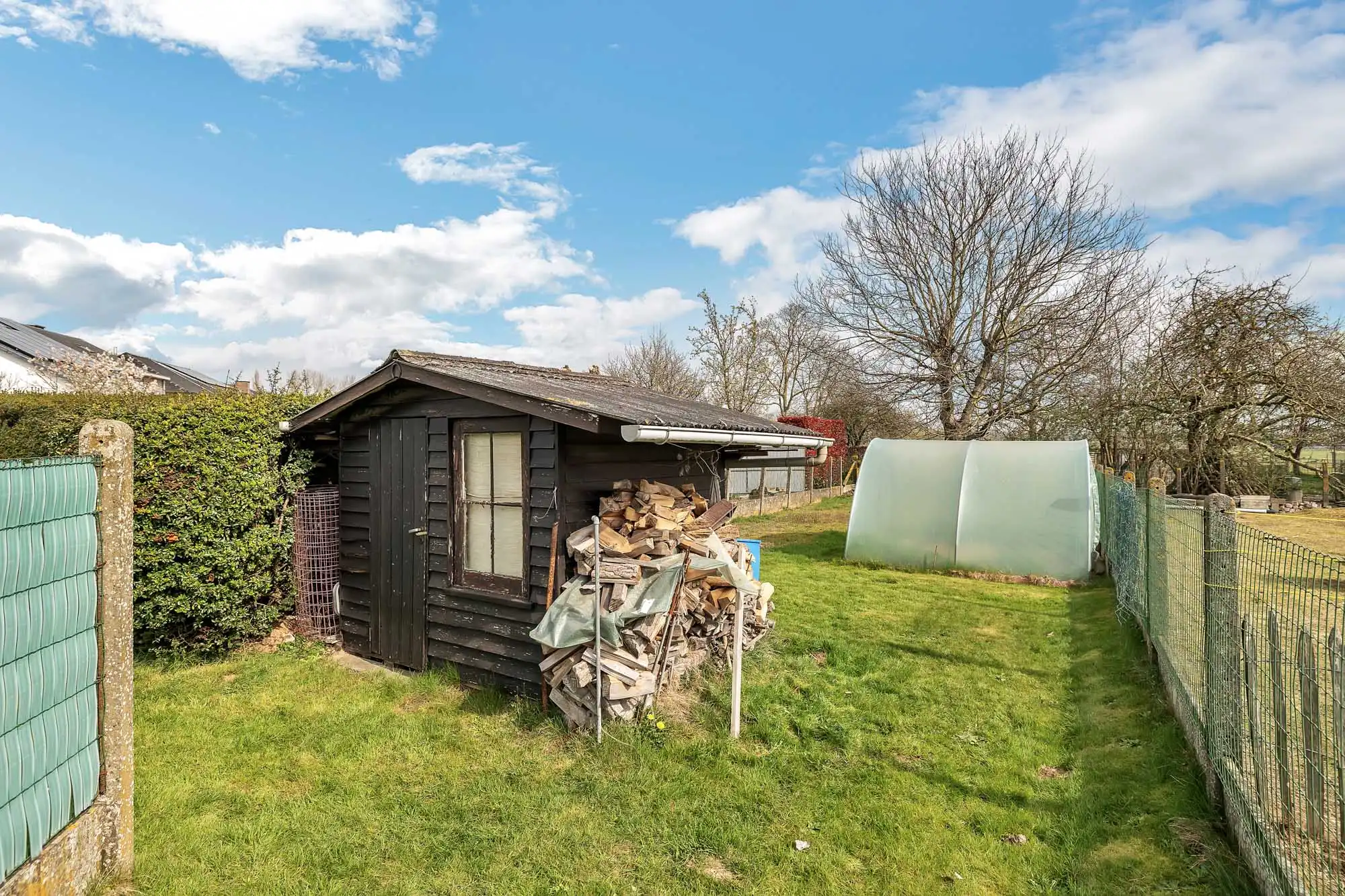 Goed onderhouden woning met garage en tuin foto 24