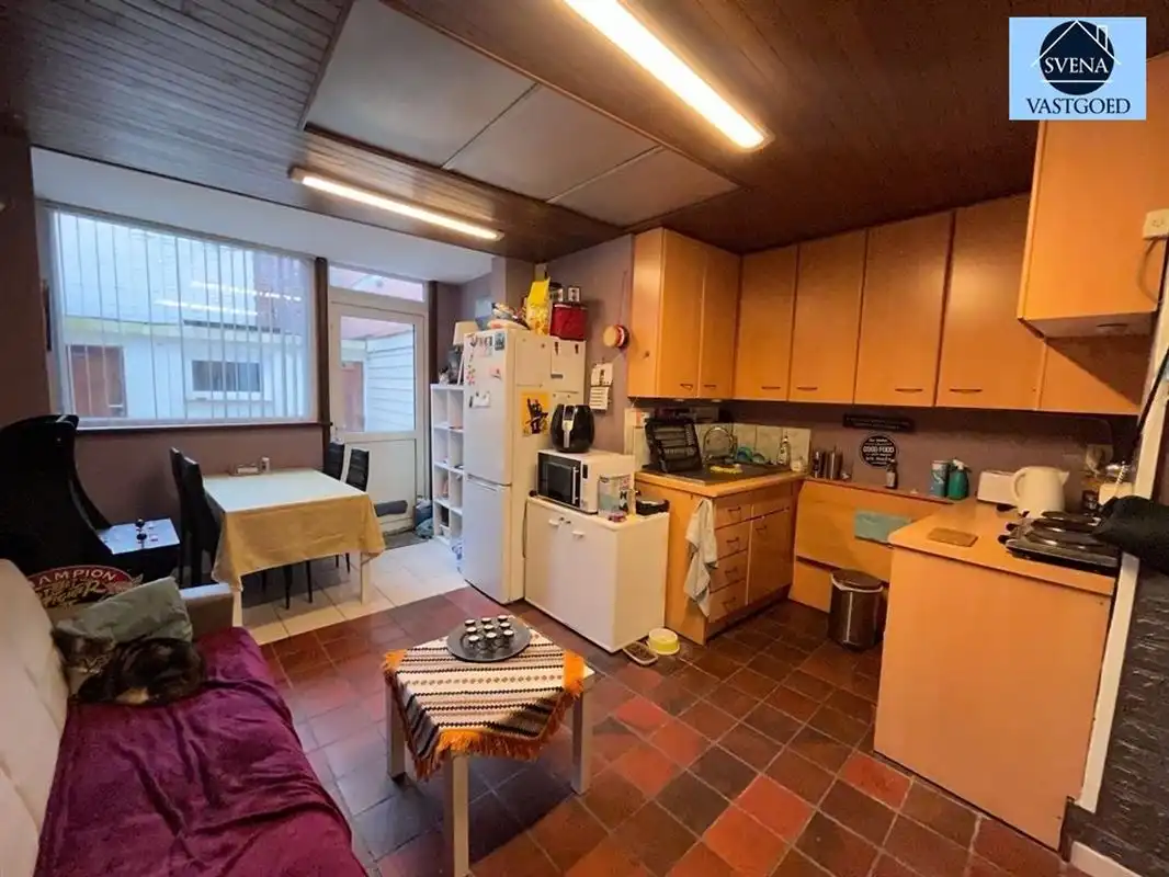 HANDELSZAAK + WOONST IN HET CENTRUM VAN GERAARDSBERGEN foto 2