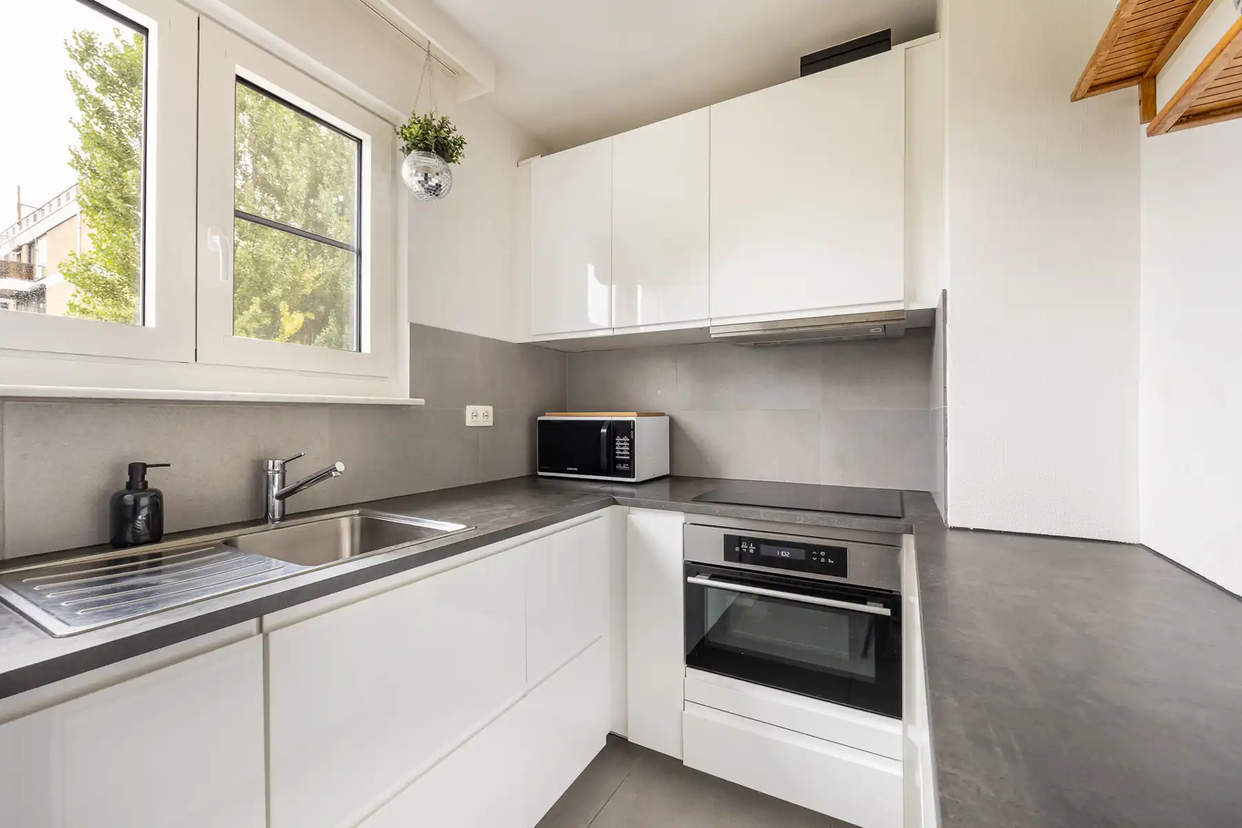 INSTAPKLAAR APPARTEMENT MET 1 SLAAPKAMER EN TERRAS GELEGEN OP TOPLOCATIE TE HASSELT! foto 11