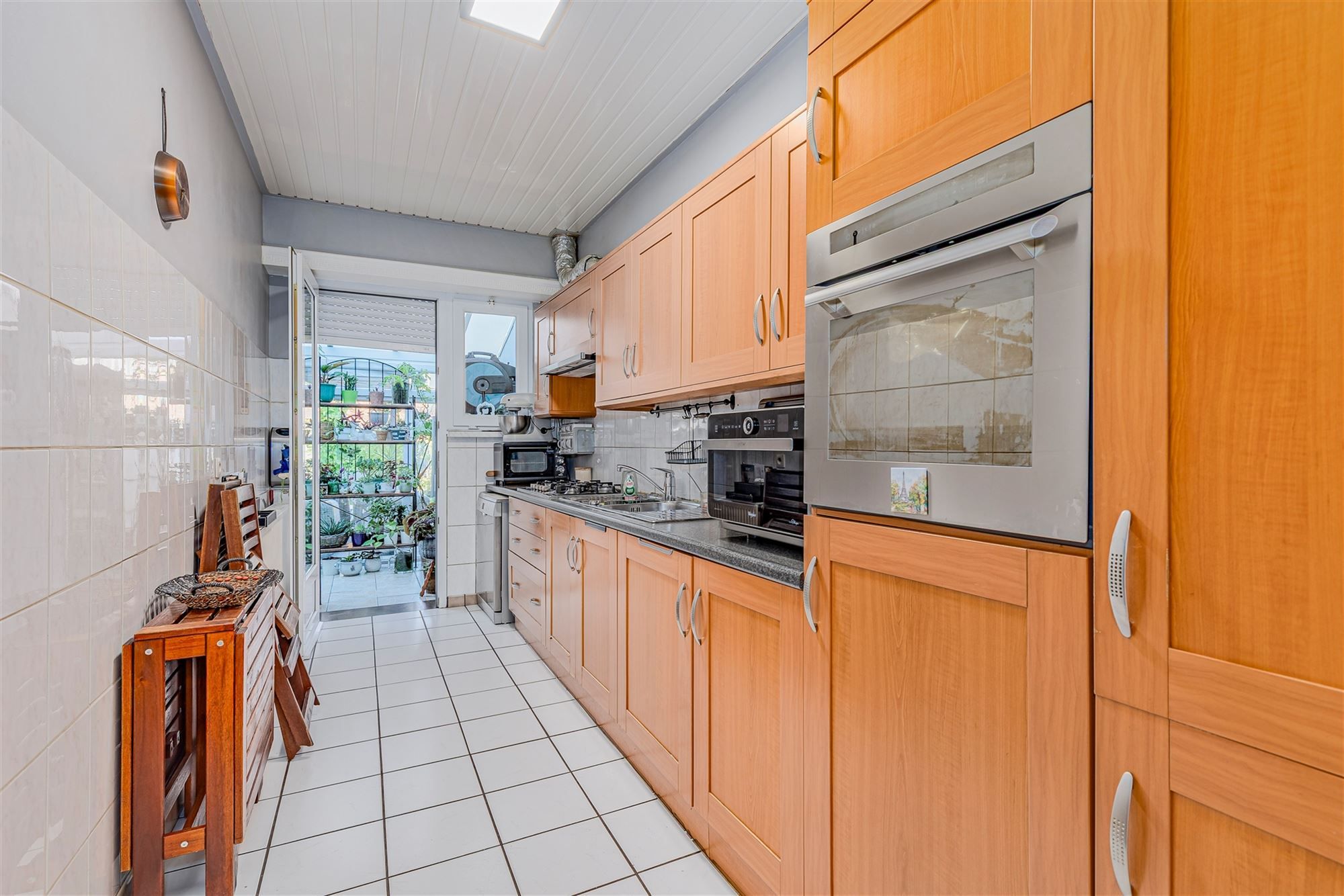 Mooi ingerichte woning met 4 slk, 2 badk en ruime stadstuin in Merksem foto 10