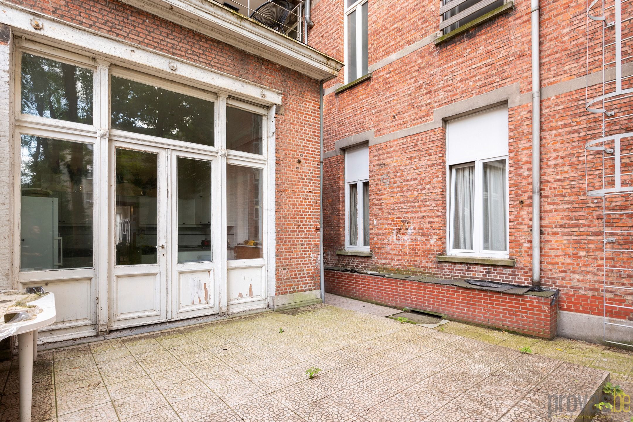 AUTHENTIEKE STADSWONING MET TUIN CA 300 M² AAN HARMONIE foto 17