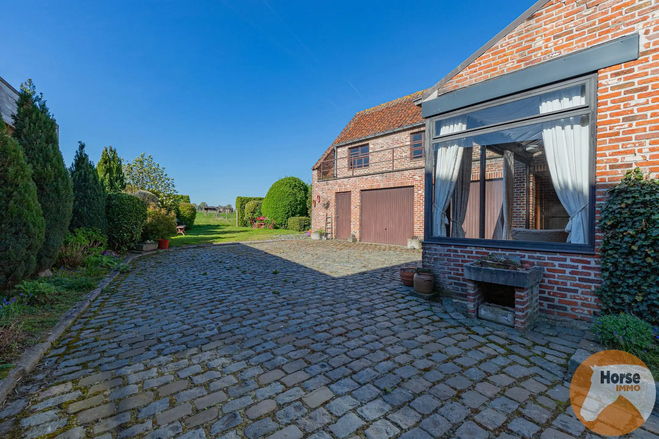 ERONDEGEM - Verzorgde 4-gevelwoning met achterliggende weide foto 6