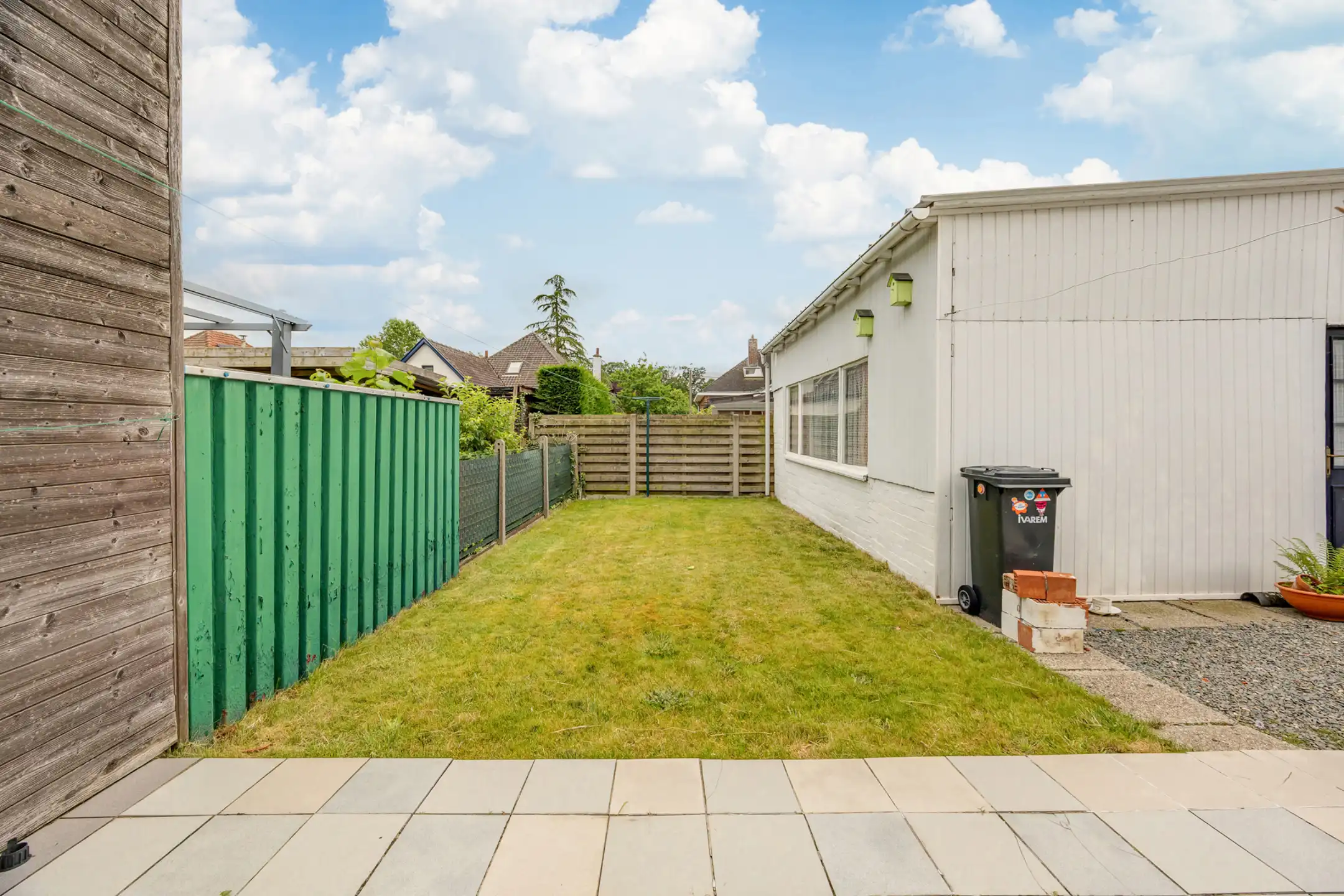 Halfopen bebouwing met tuin en garage foto 12
