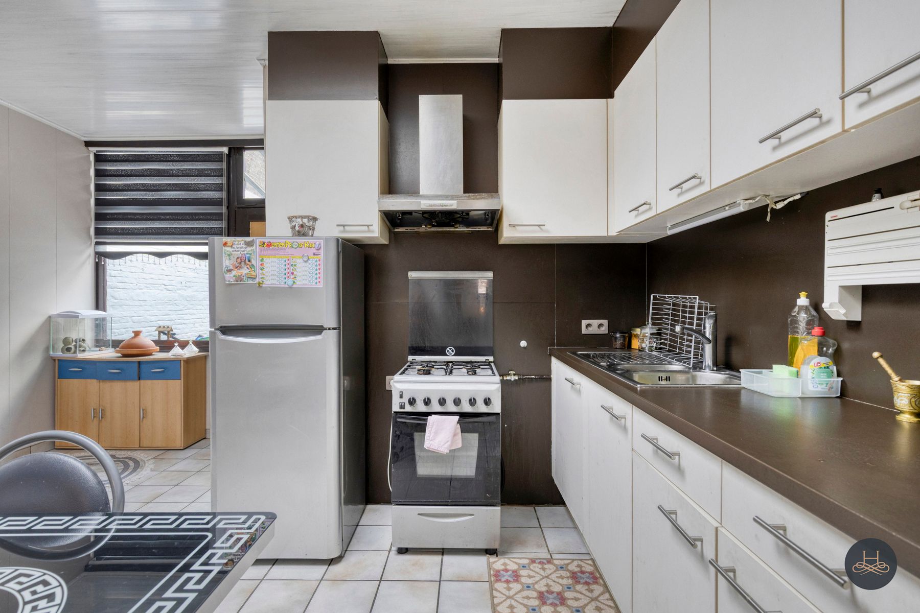 Knappe renovatiewoning met binnenplaats en 4 slaapkamers foto 9