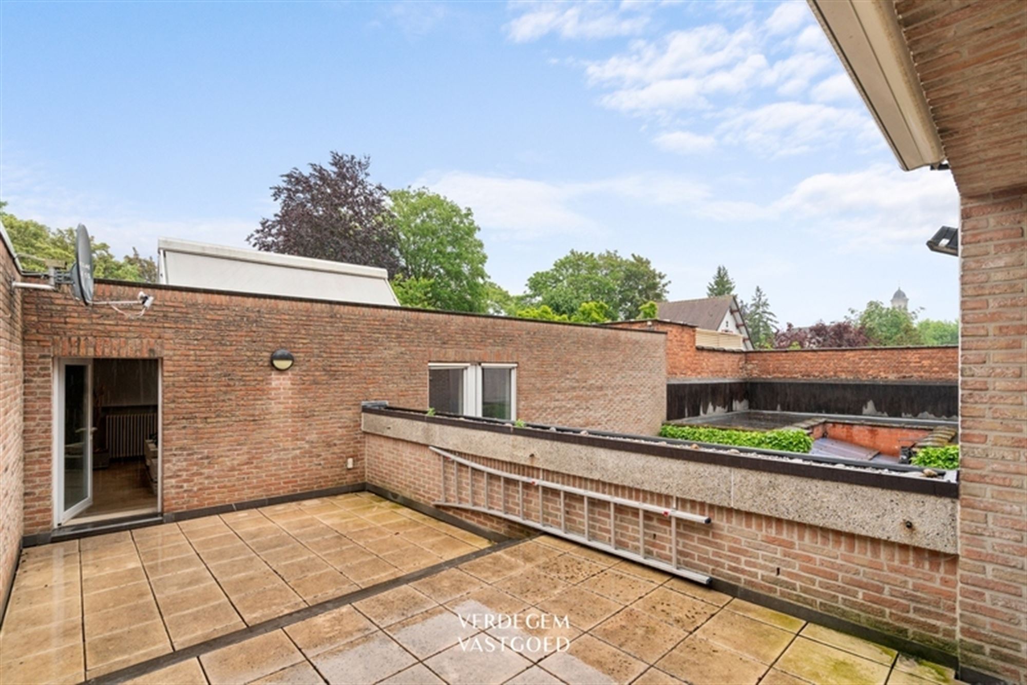 Unieke opbrengsteigendom met 4 entiteiten: handelsruimte, twee 1 slpk-appartementen en grote woning foto 27