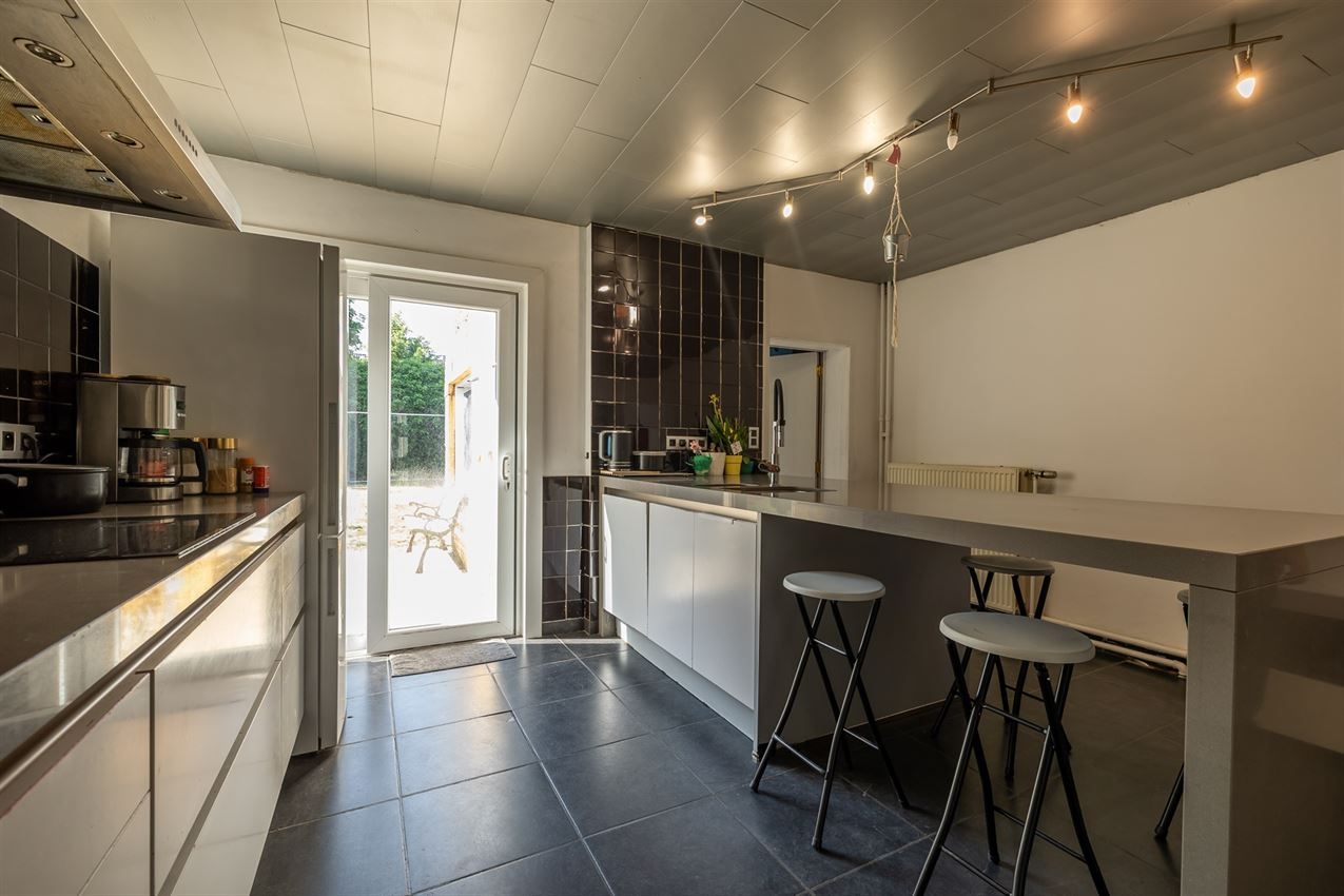 Stadswoning met 3 slpk., tuin en garage foto 9