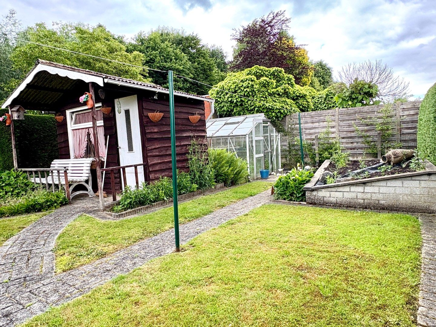 Uitzonderlijk mooi gelegen HOB woning met 4 slks, tuin en garage. foto 9