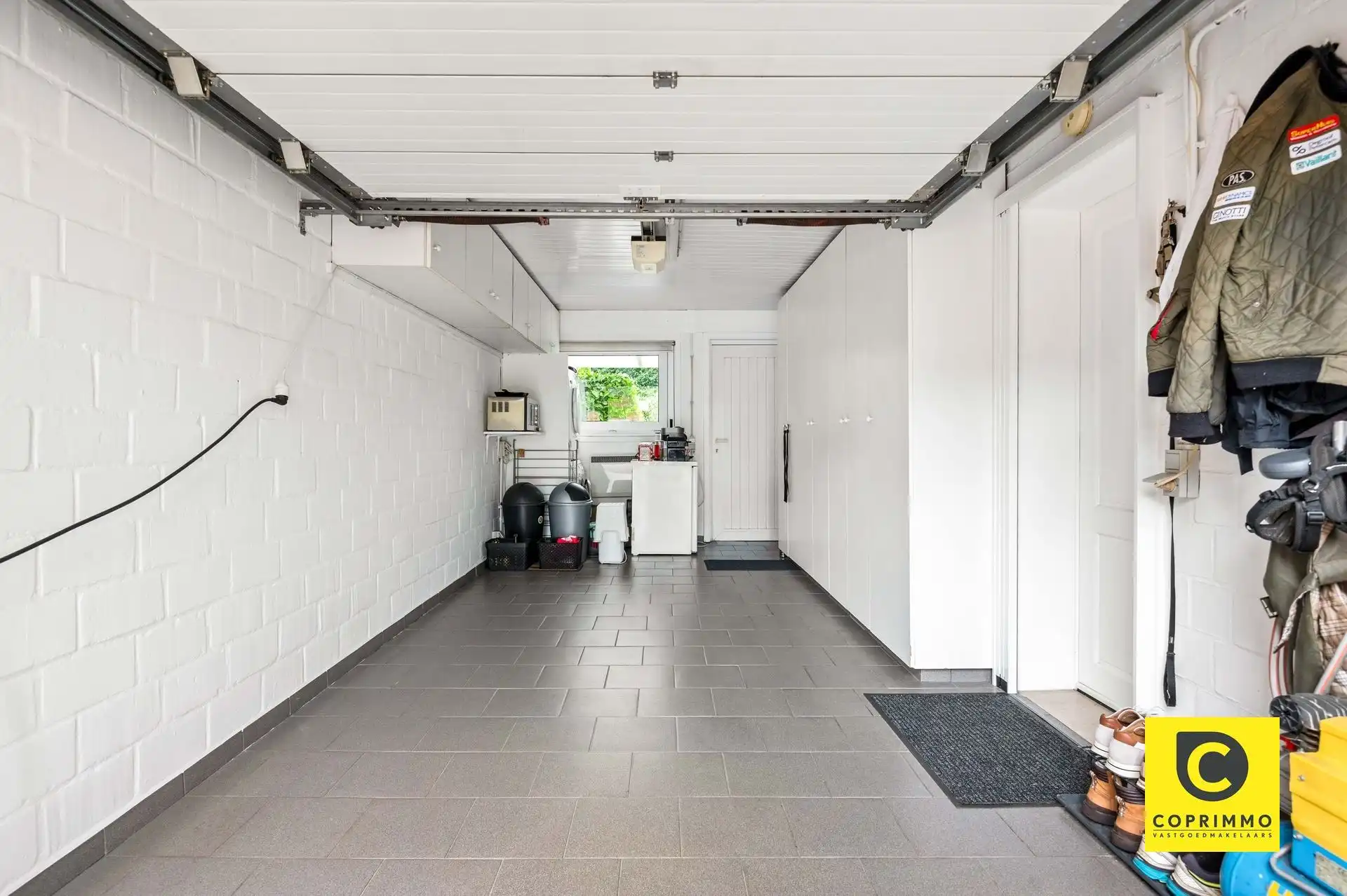 Gelijkvloers app.: 2 slk, garage en tuin  foto 14