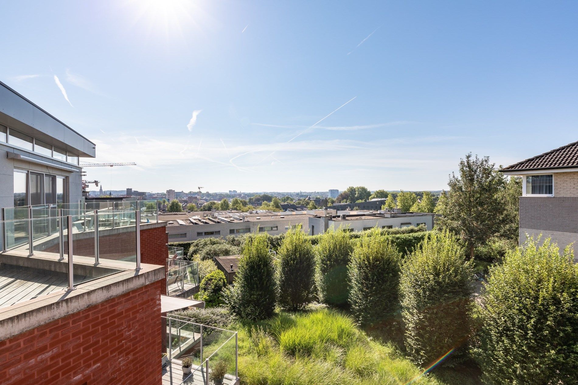 Licht hoekappartement met groot terras en uitzicht over Leuven foto 4