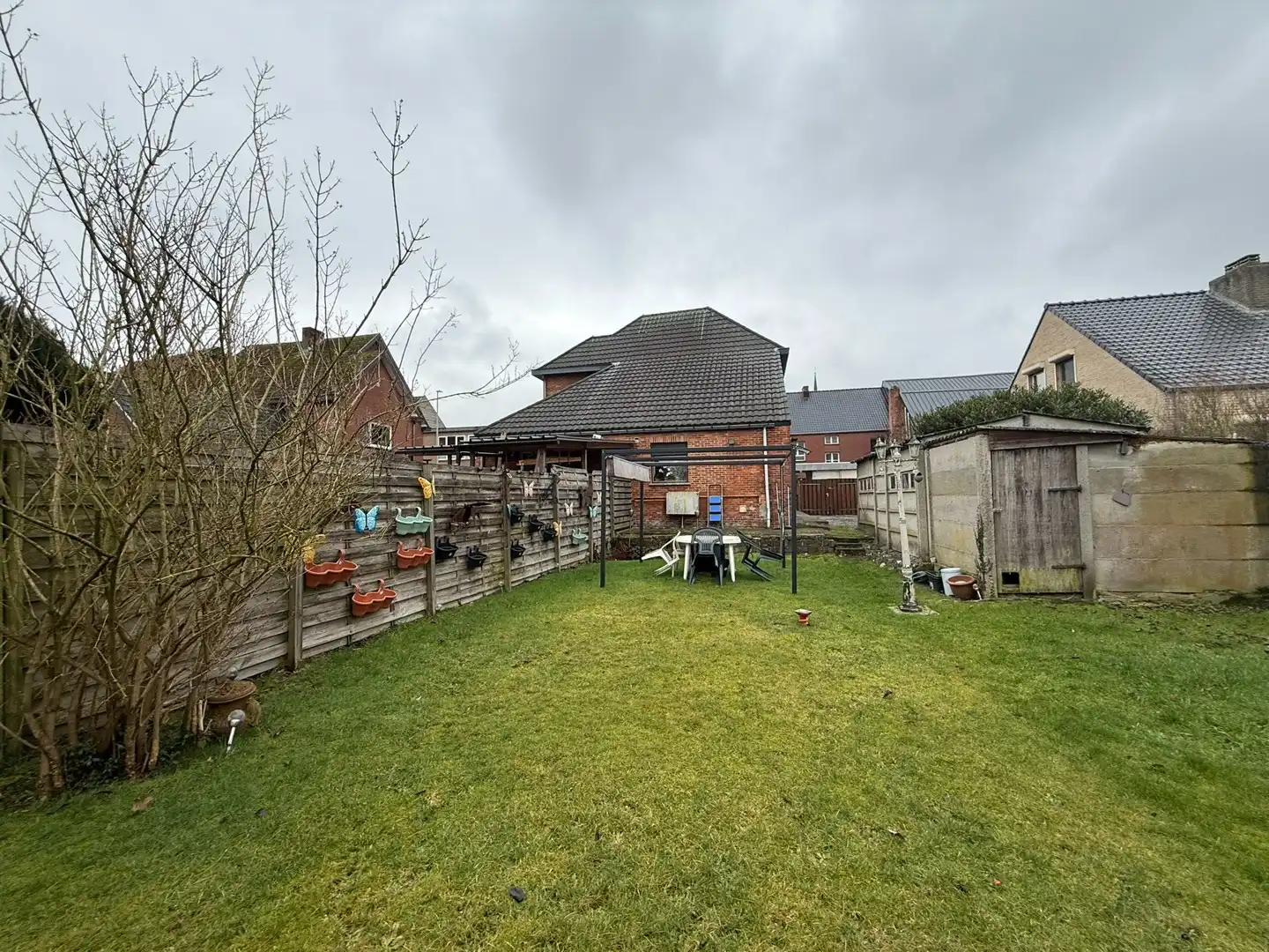 Opbrengsteigendom bestaande uit 2 halfopen woningen met garage en tuin te Hechtel. foto 42