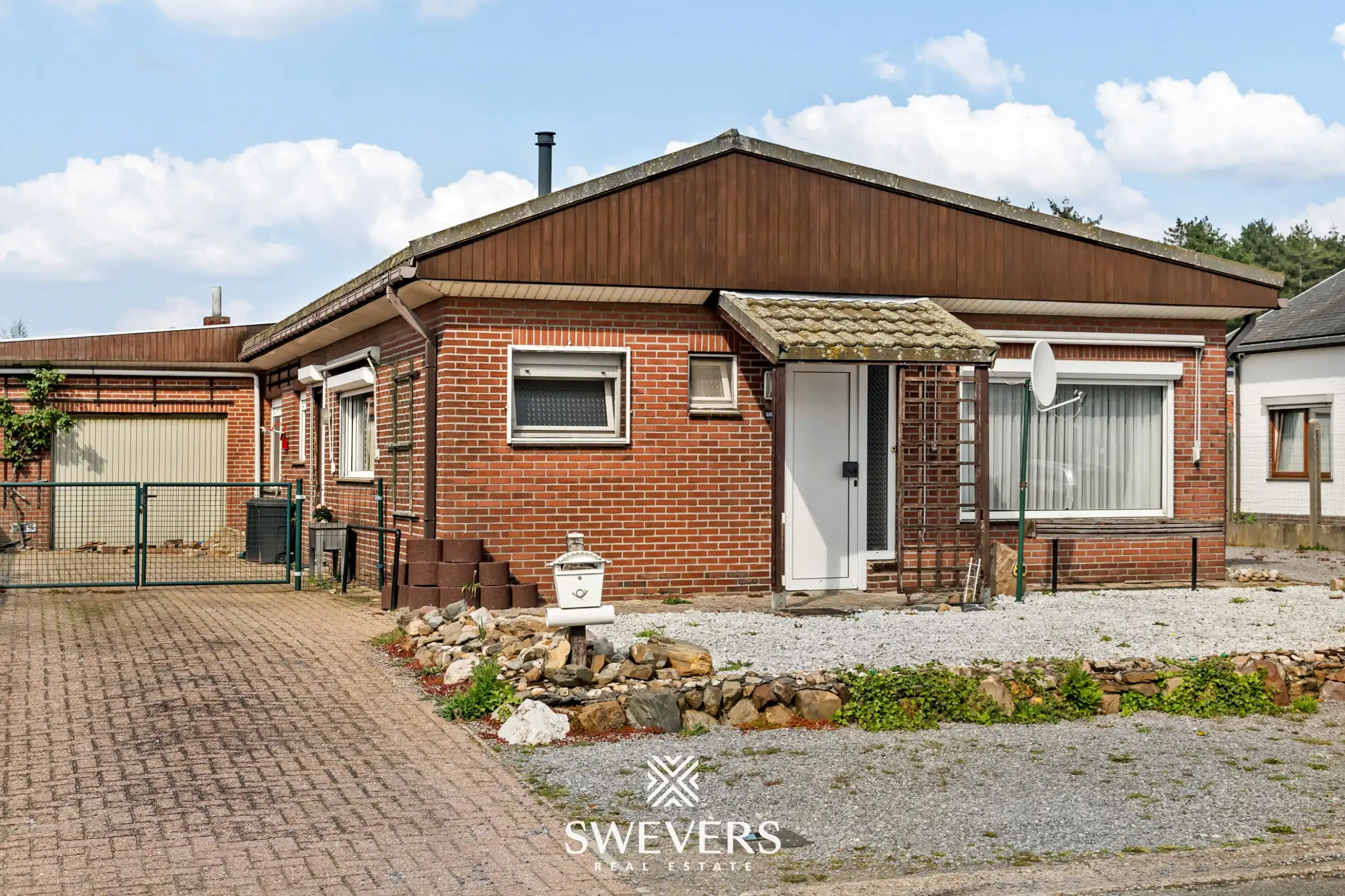 Instapklare gelijkvloerse woning met 4 slaapkamers op rustige en centrale ligging in Houthalen foto 2