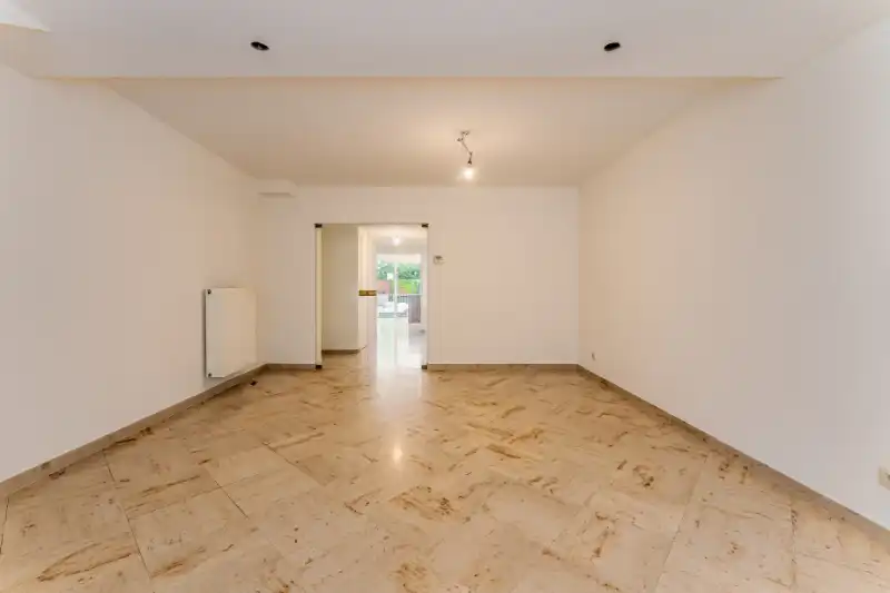 Genoveerd appartement met drie slaapkamers en groot terras foto 4