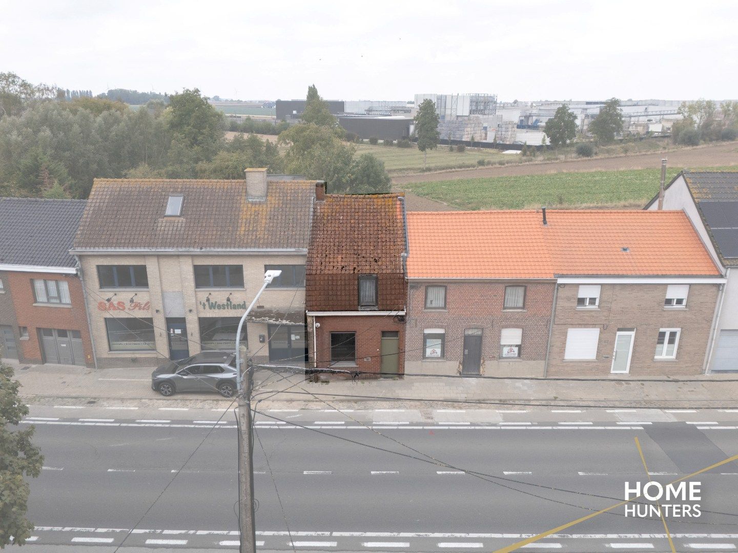 Te renoveren woning met 3 slaakamers en een zonnige tuin foto 2