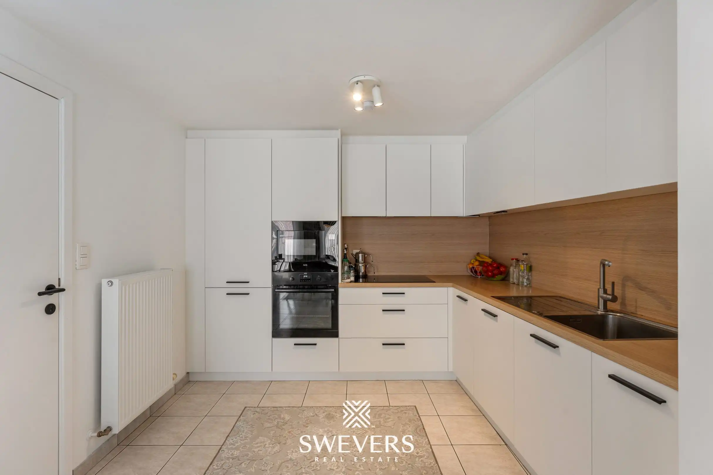 Gerenoveerd 2-slaapkamerappartement met ZW-terras vlak bij Hasselt centrum foto 14