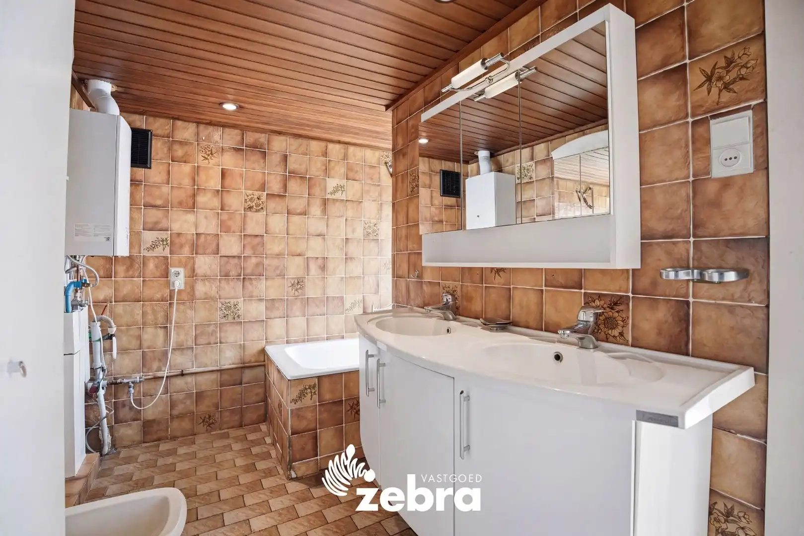 Op te frissen woning met veel potentieel, tuin en garage nabij het centrum van Tielt! foto 9