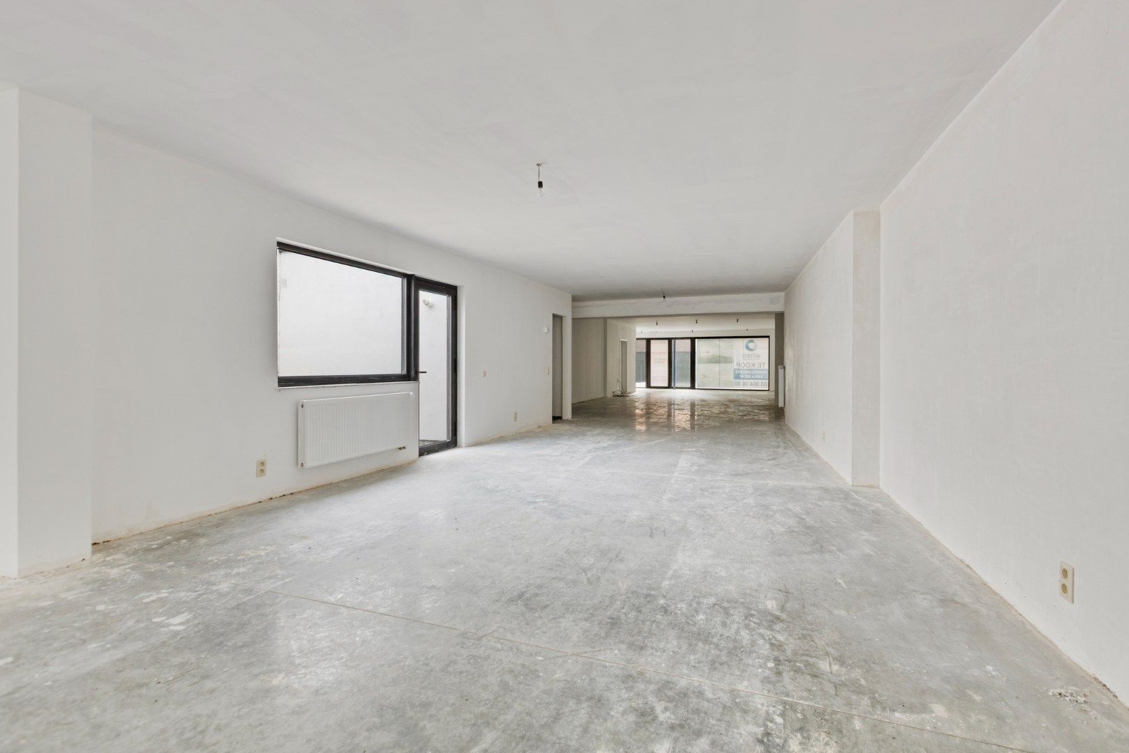 Ruime handelspand van 243 m² centraal gelegen in Mol centrum !  foto 11