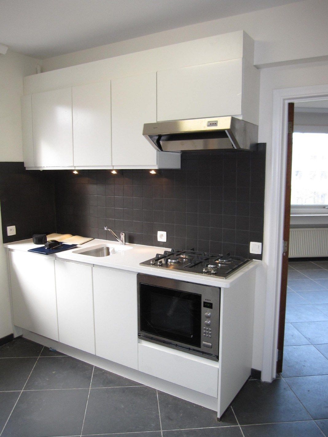 Ruim hoekappartement met garage foto 2
