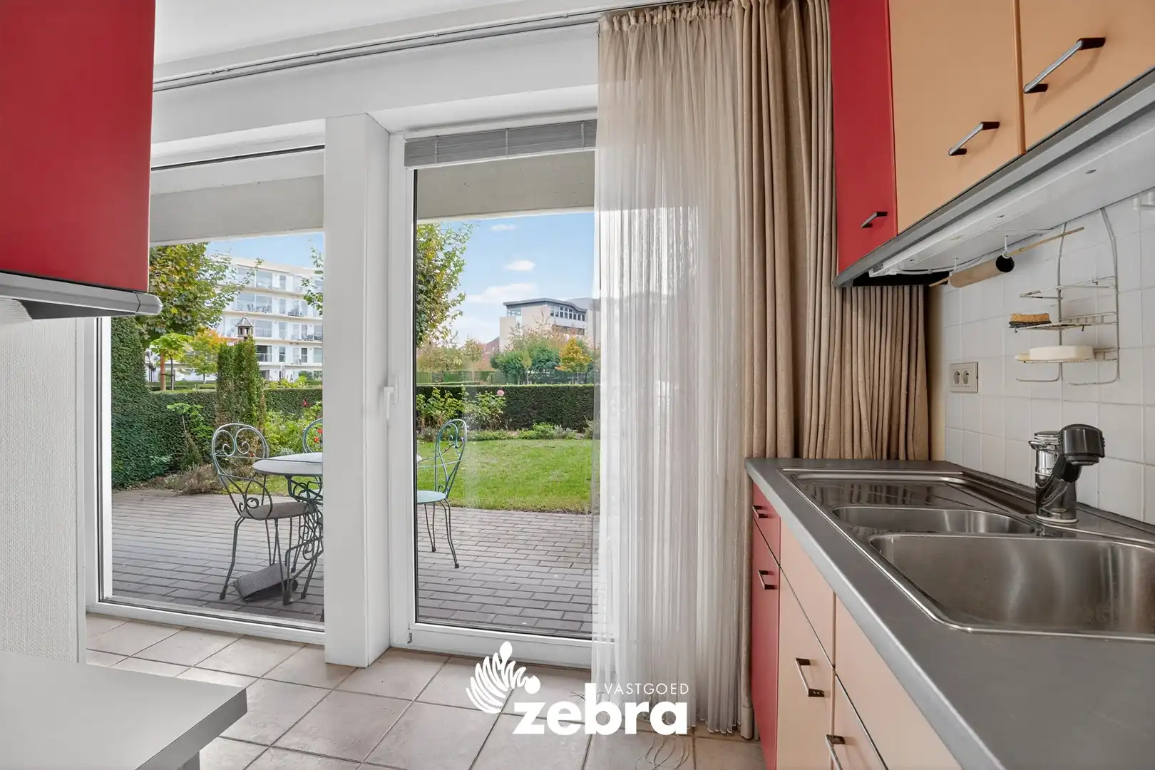 Gelijkvloers appartement met zuidoost gerichte tuin te Roeselare! foto 11