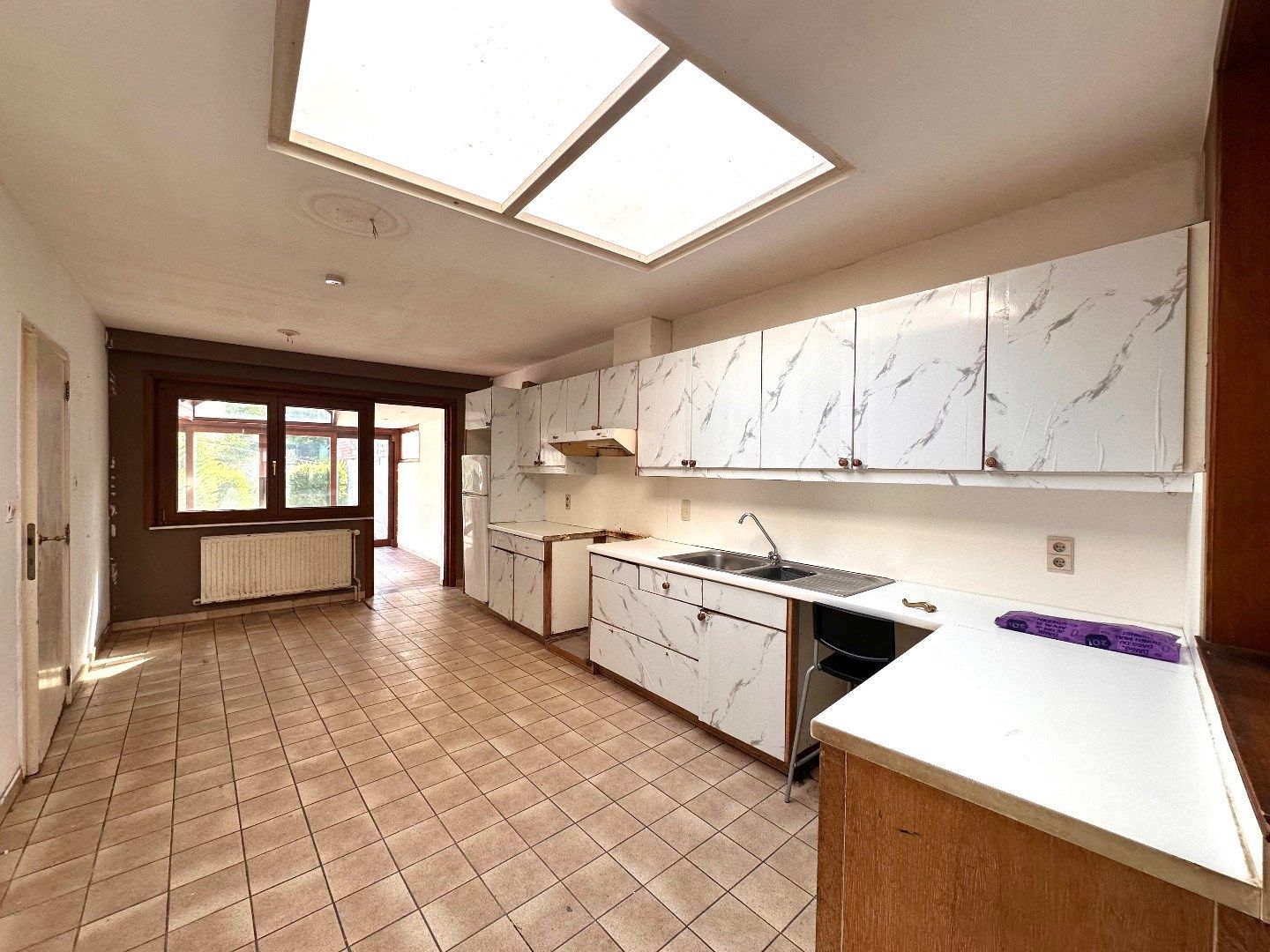 Charmante en ruime woning met 4 slaapkamers en veel potentieel in het hart van Tongeren foto 4