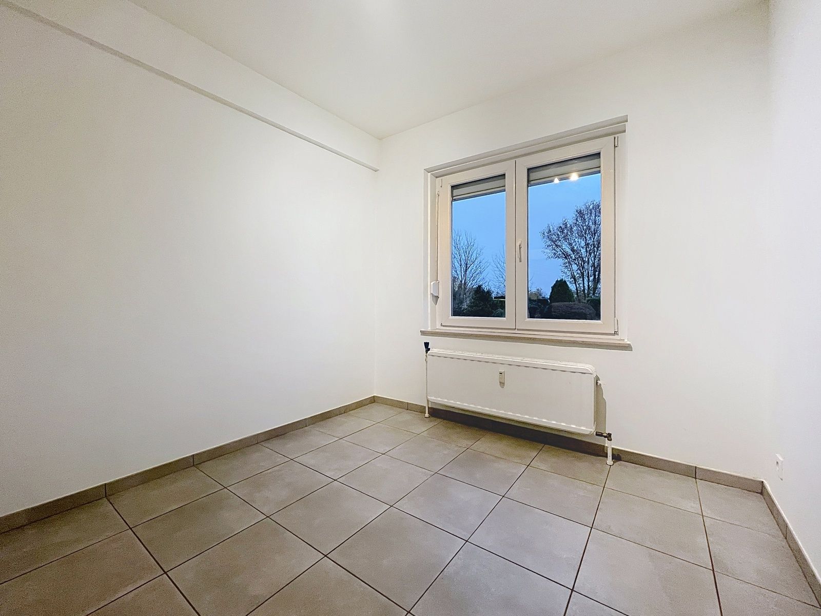 Gelijklvloers app met 2 slpks - garage en gemeenschap tuin foto 7