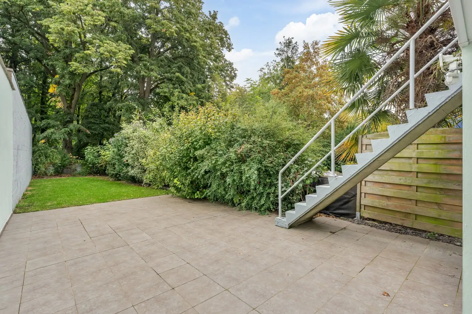 Gerenoveerde en energiezuinige woning met 4 slaapkamers en een tuin grenzend aan het Mariapark te Leuven! foto 8
