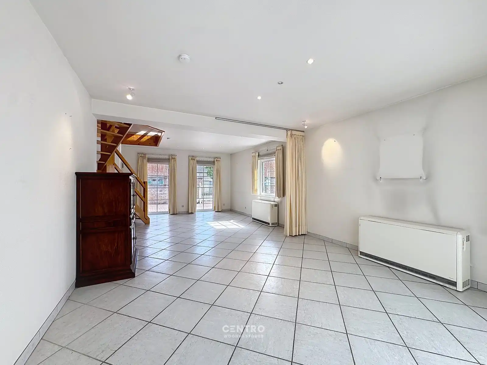 Ruime woning met opslagruimte in aangename omgeving! foto 12
