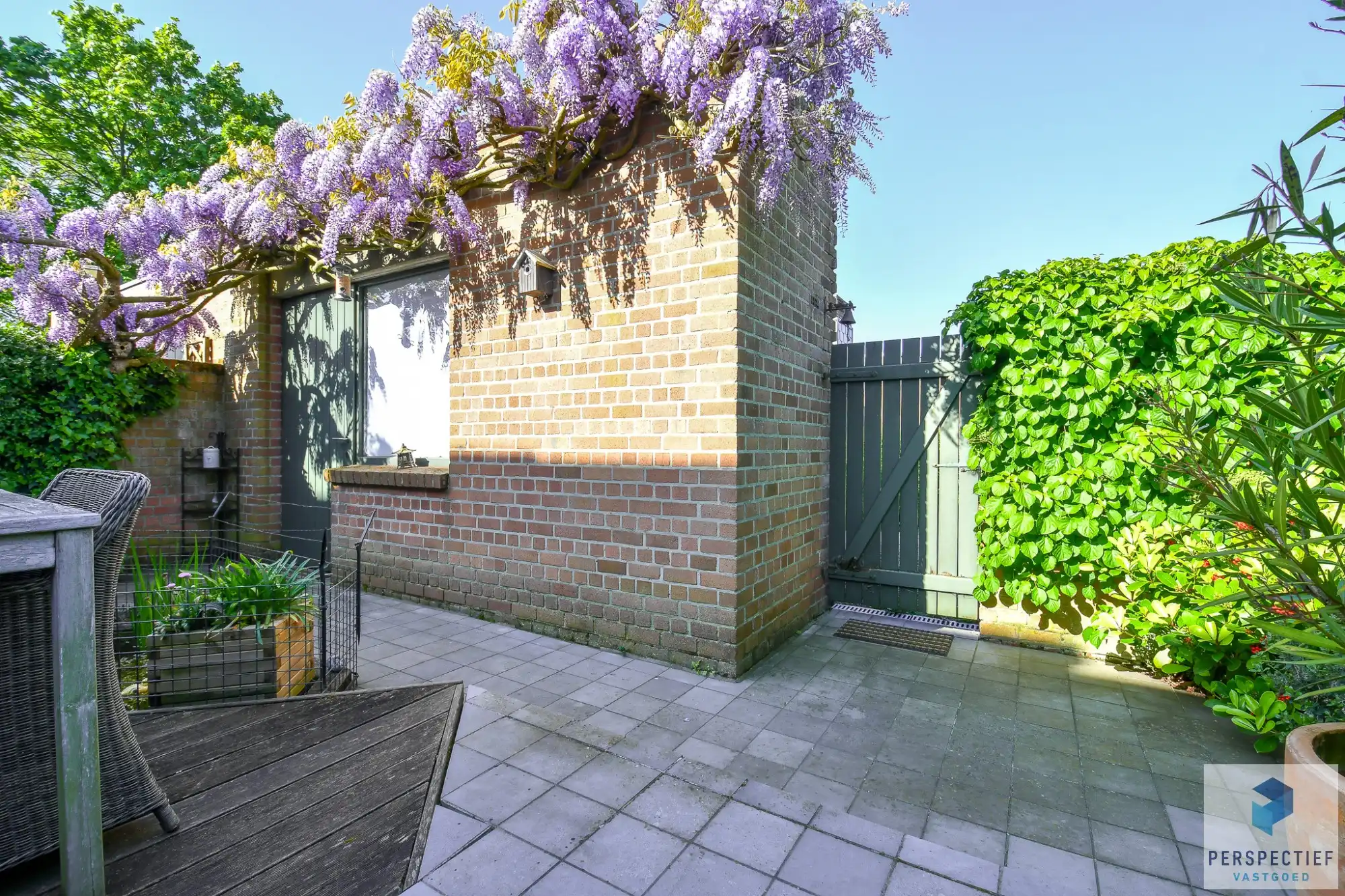 Ruime goed onderhouden woning met 3 slpk en tuin foto 4