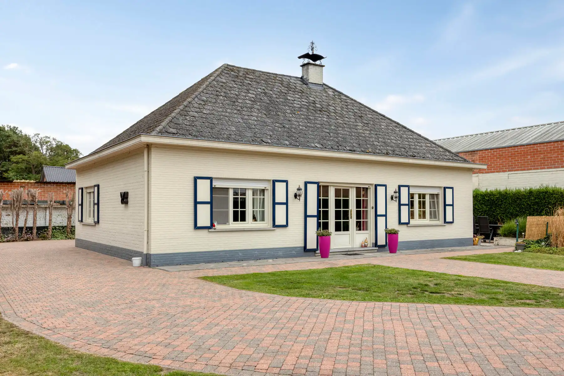 Achterliggende gelijkvloerse woning op mooi perceel foto 3