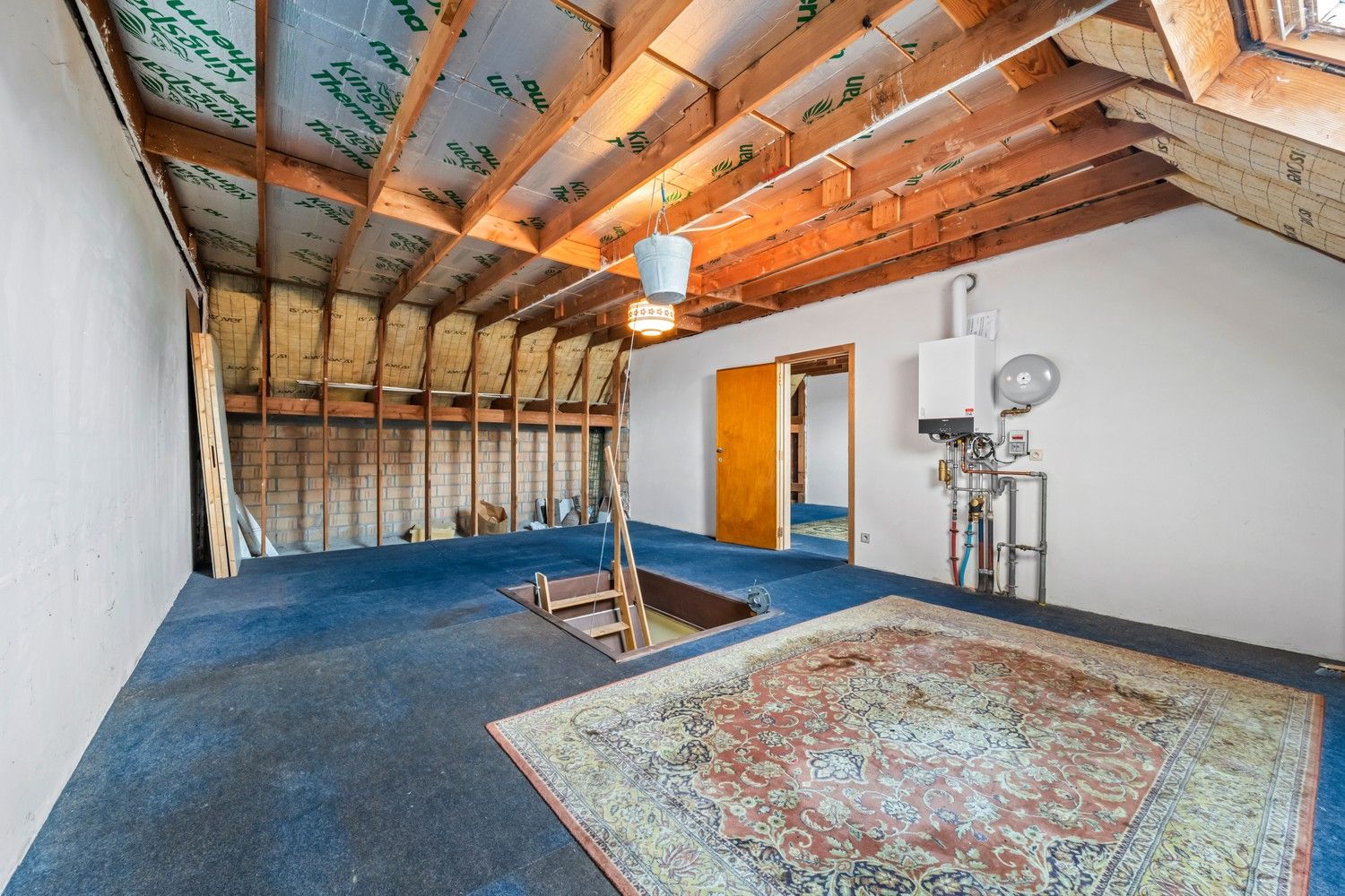 Rijwoning met potentieel, zonnige tuin, garage en uitbreidingsmogelijkheden te koop in Ruddervoorde foto 17