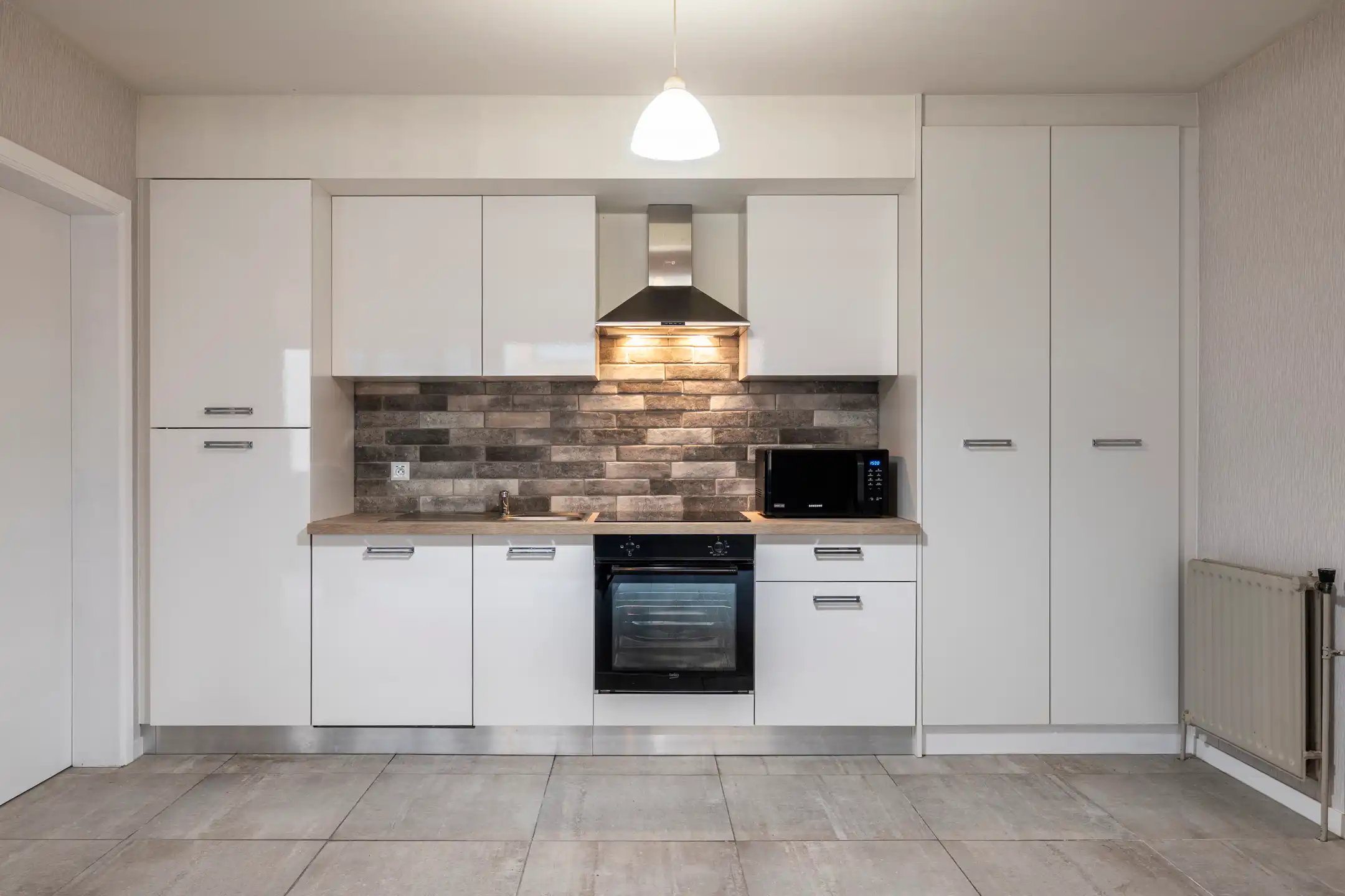 Recent gerenoveerd app. (103m²) met terras en garage foto 7