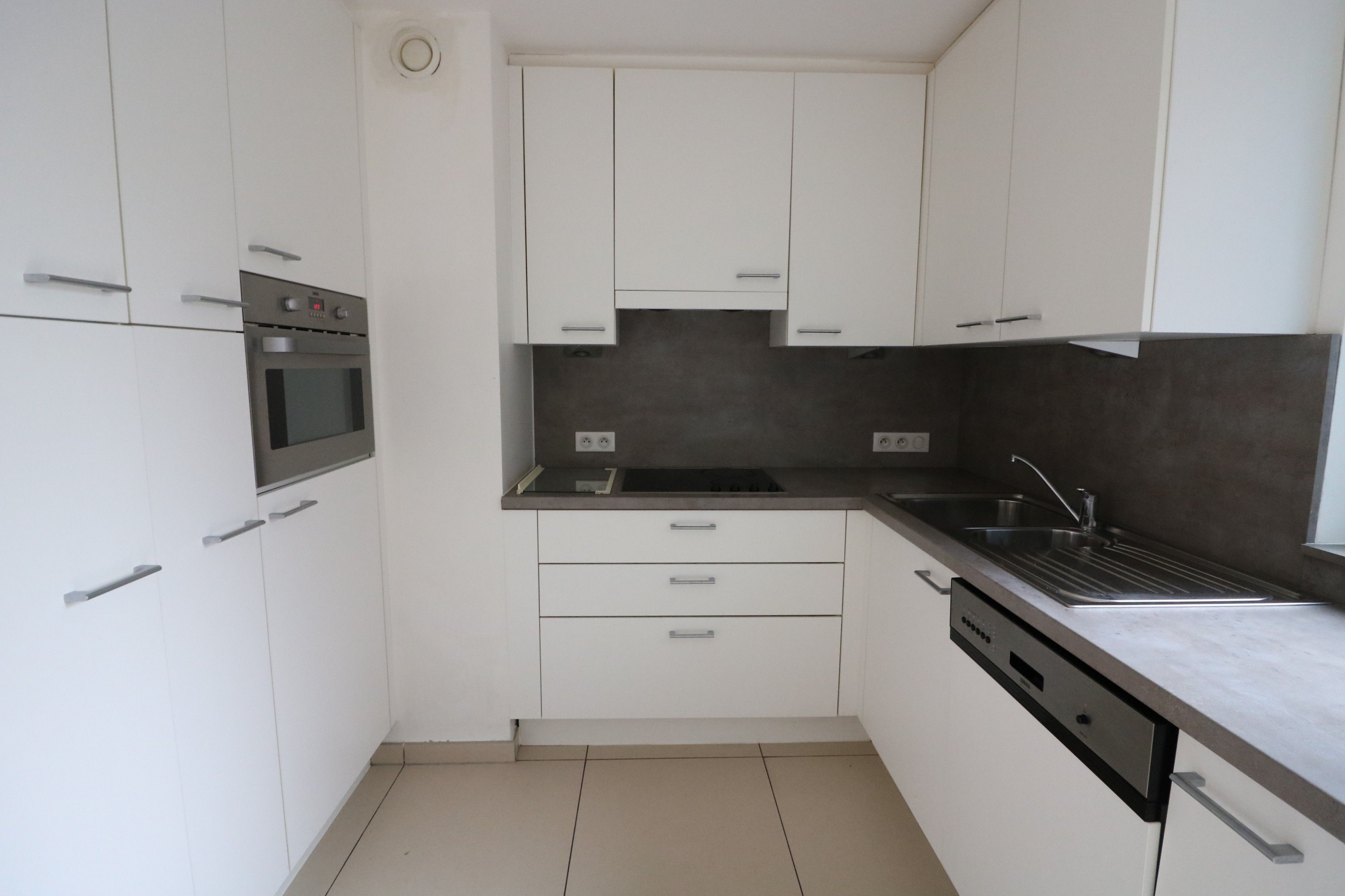 Ruim duplexappartement met 2 slaapkamers foto 2