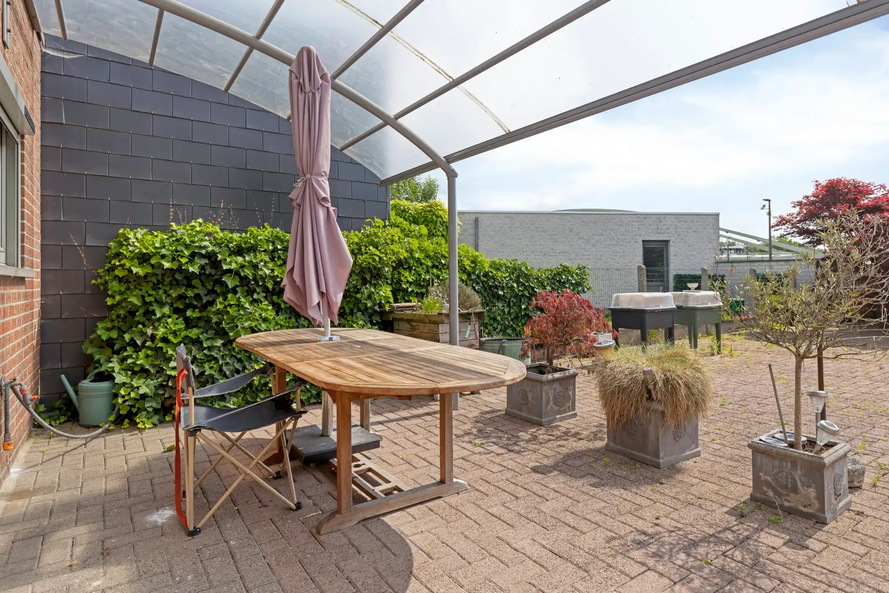 OPTIE Rustig gelegen woning met 2 garages foto 12